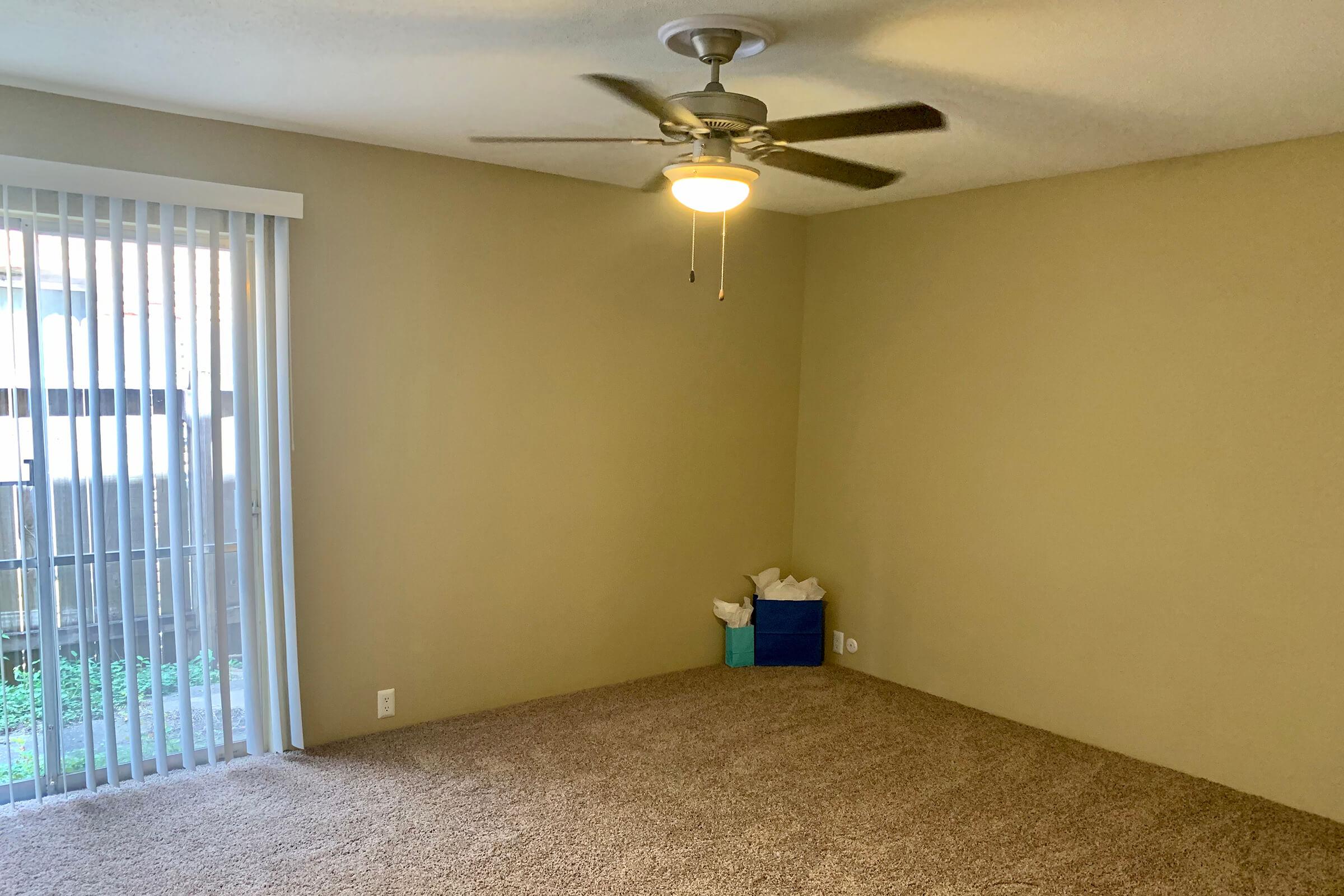 a bedroom with a large mirror