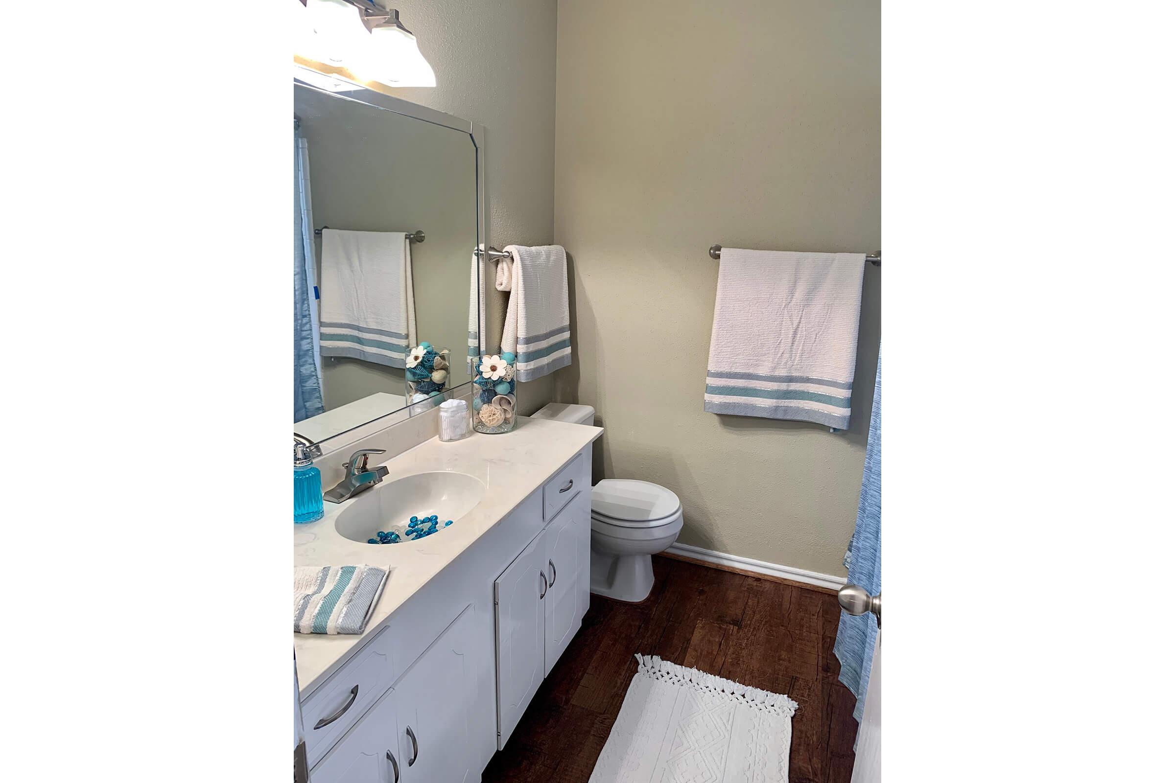 a white sink sitting under a blue sky