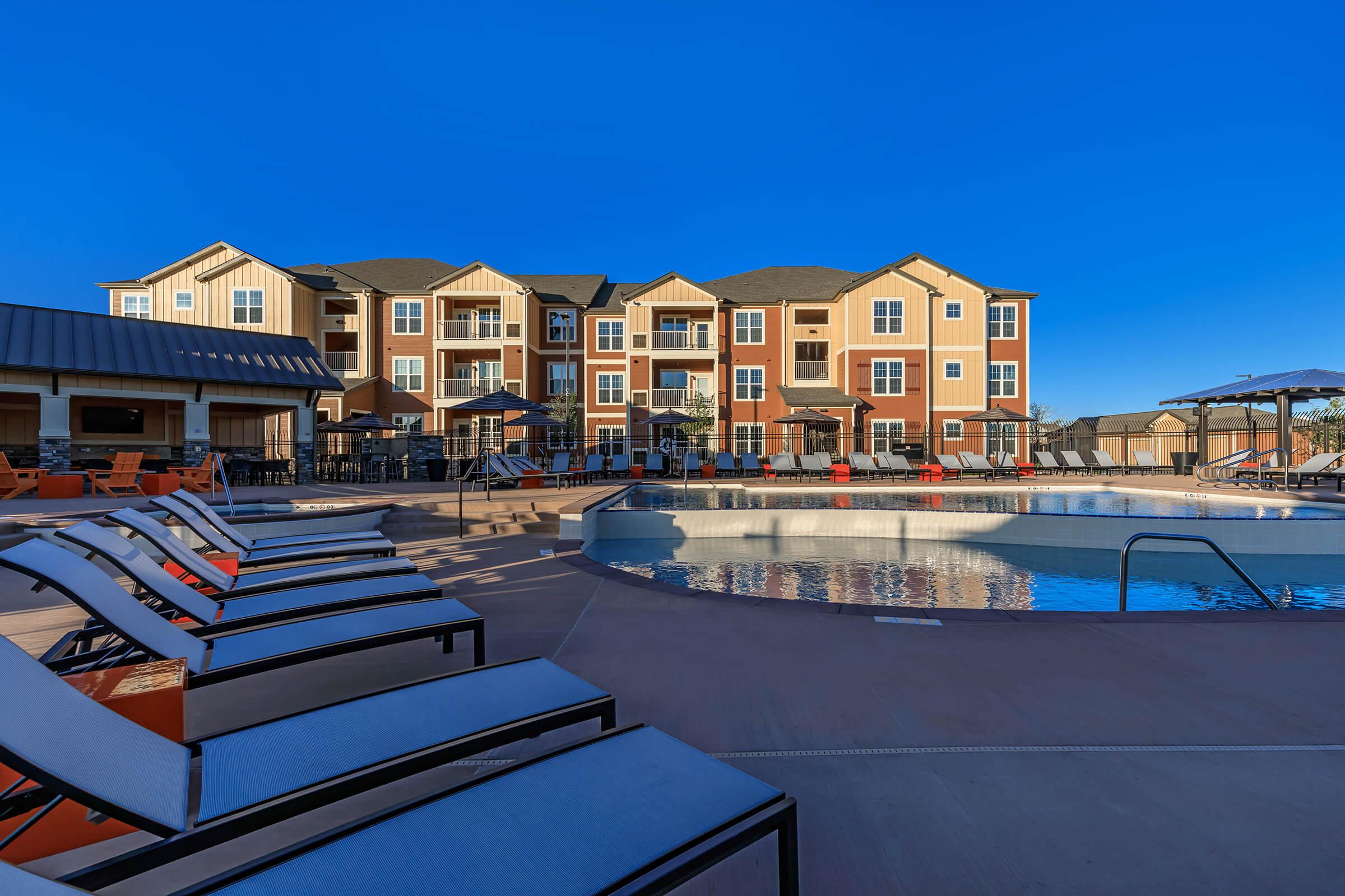 a pool next to a building