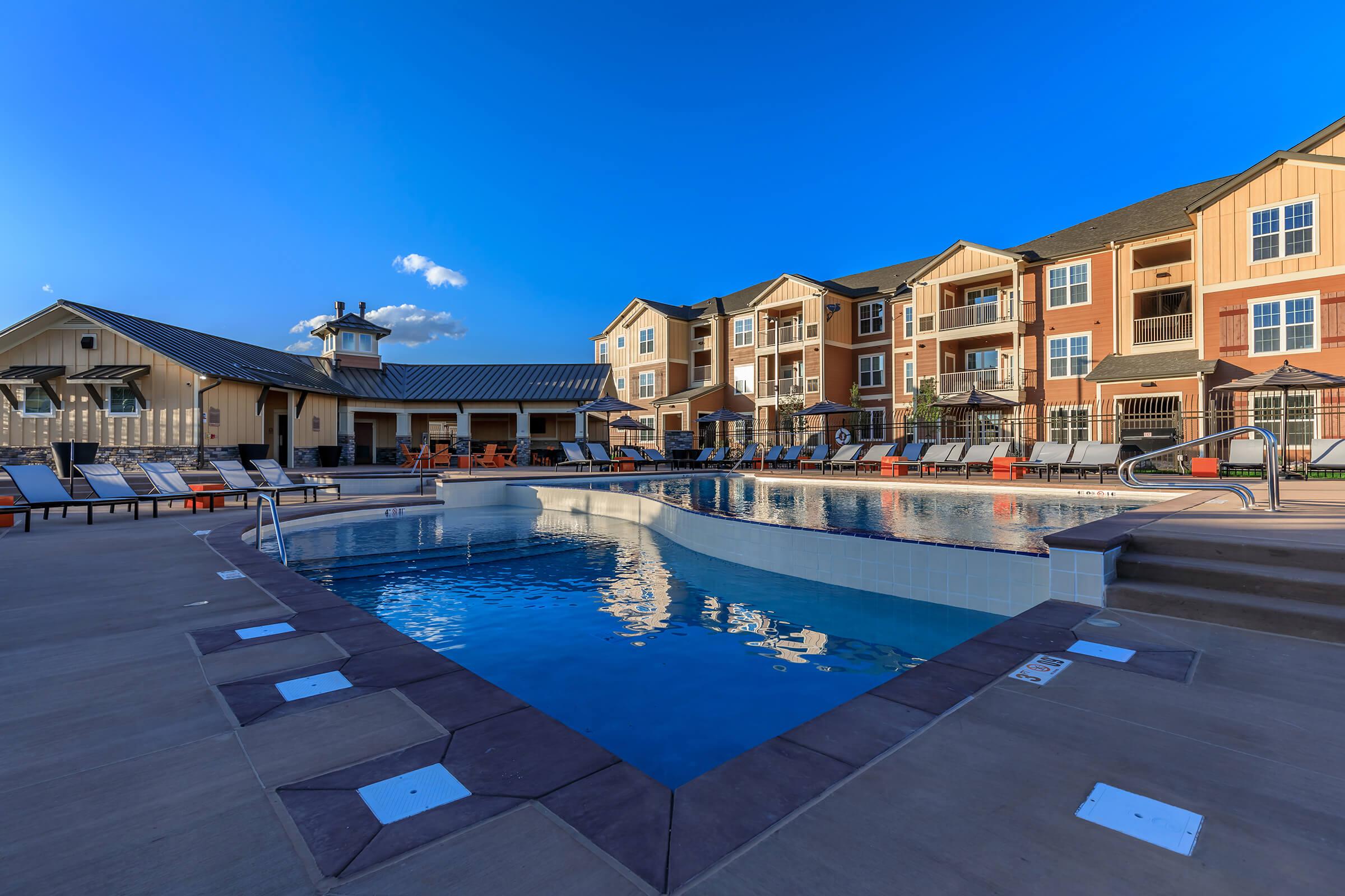 a pool next to a building