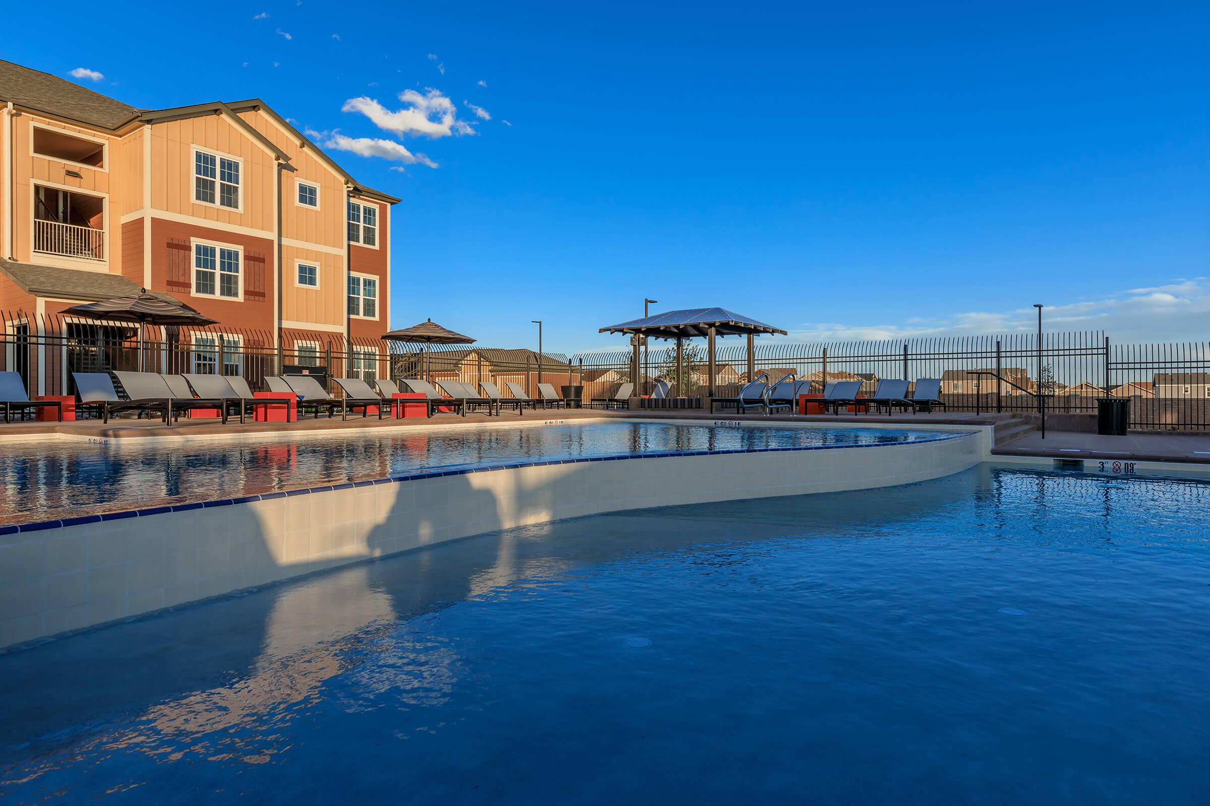 a pool next to a body of water