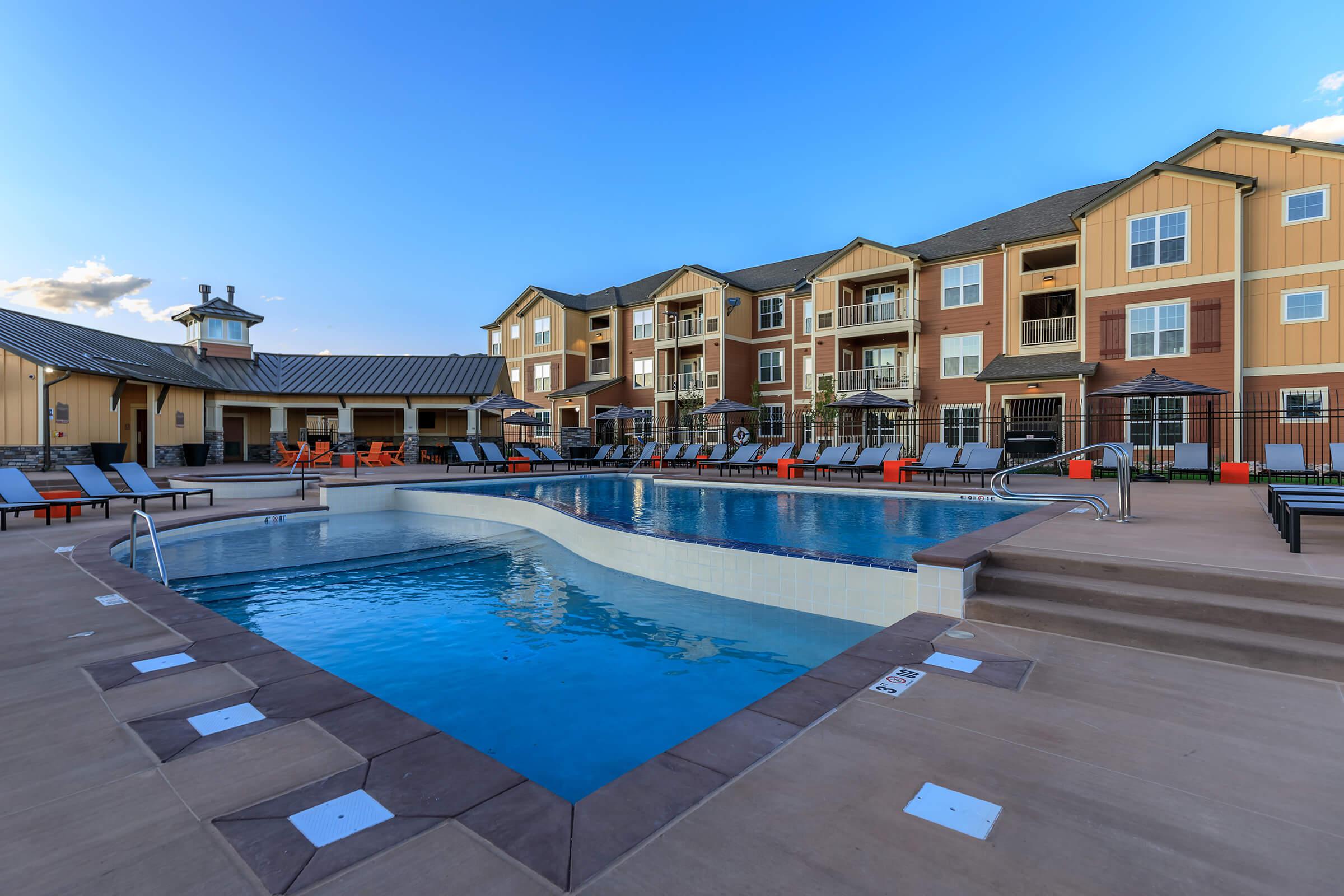 a pool next to a building