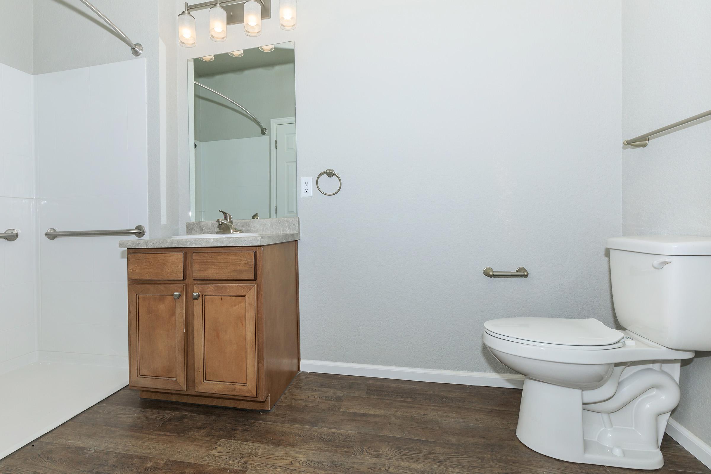 a white sink in a small room