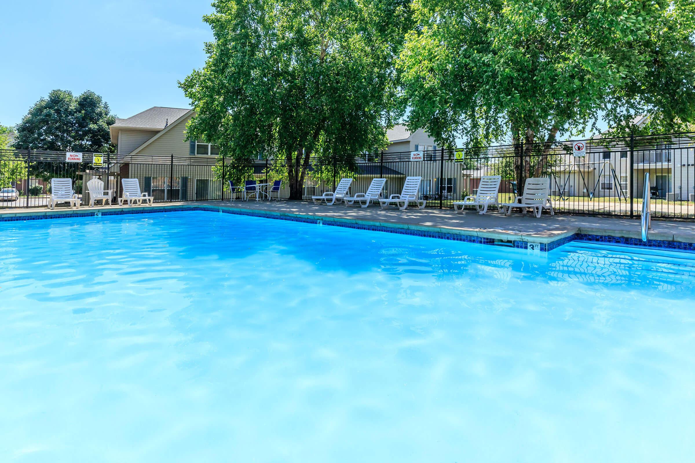 a pool next to a body of water