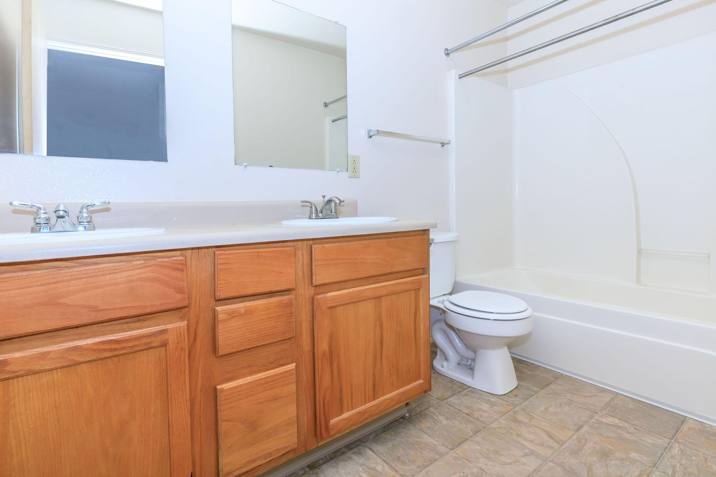 a kitchen with a sink and a window