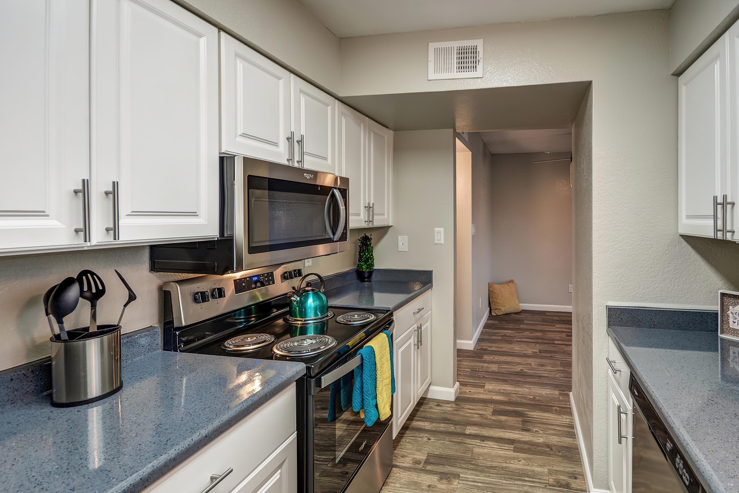 a modern kitchen with stainless steel appliances