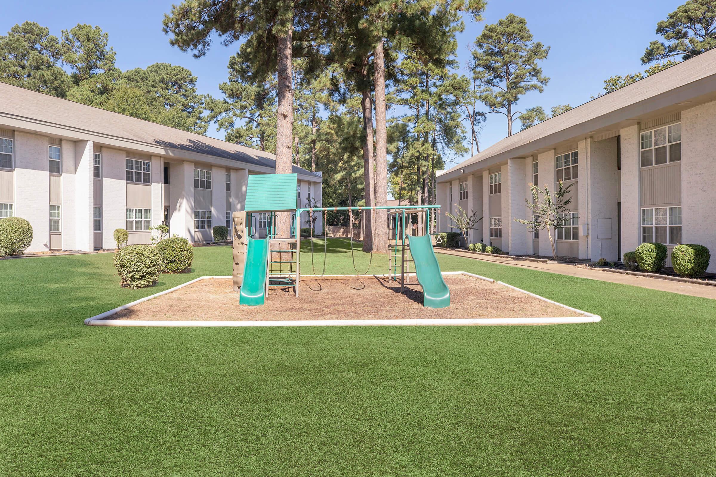 a large lawn in front of a house