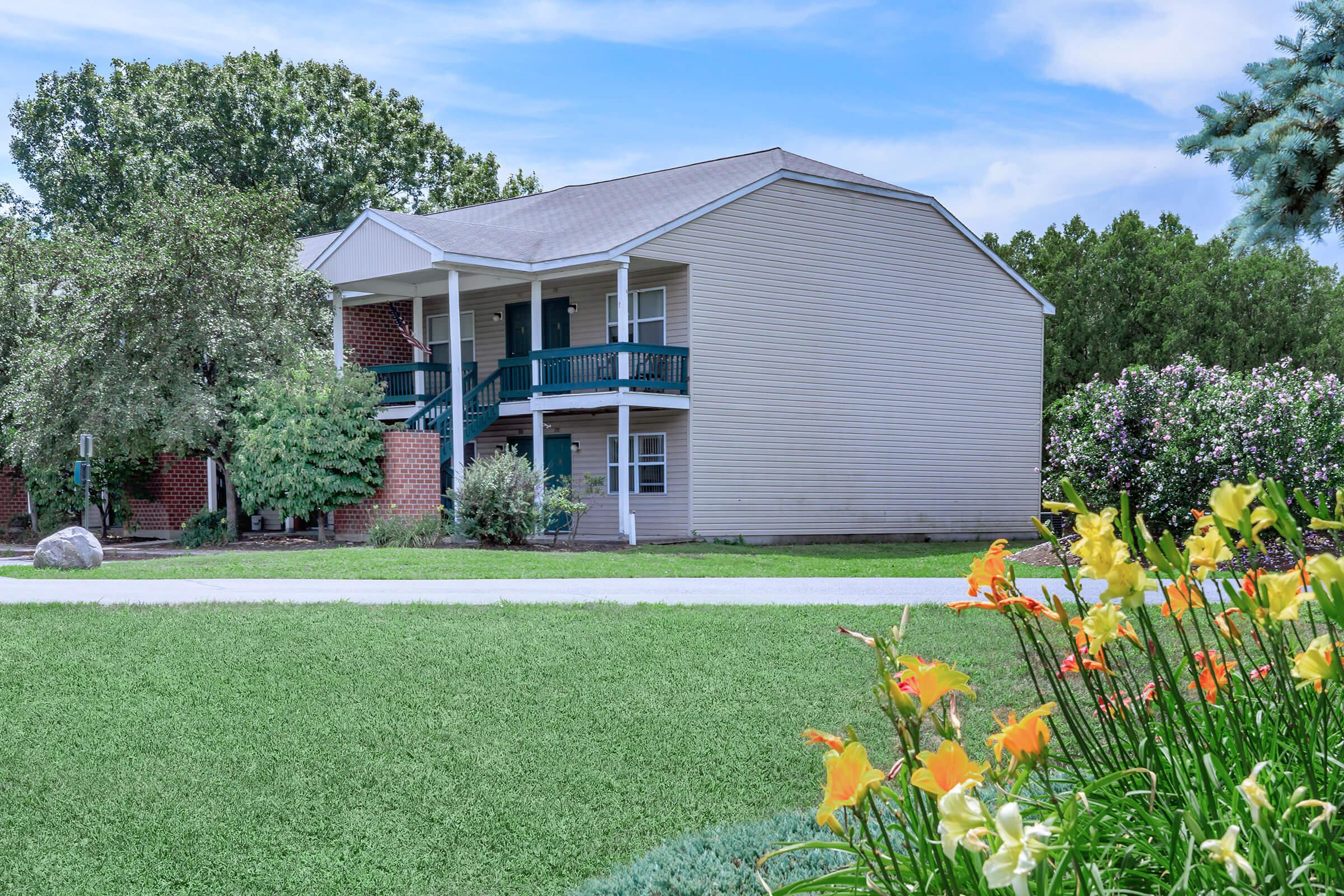 a large lawn in front of a house