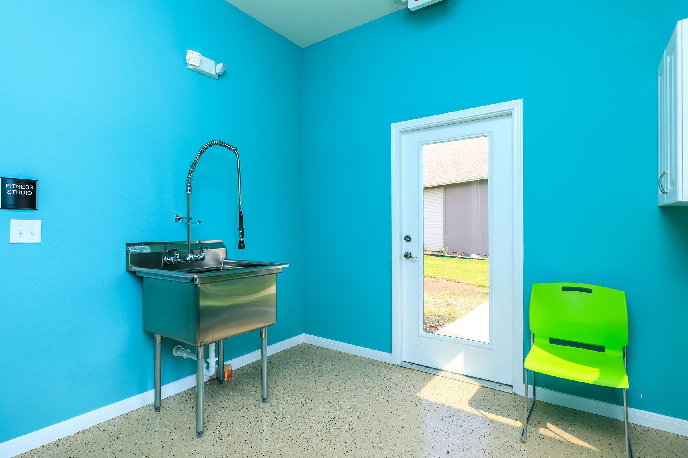 a blue chair in a room