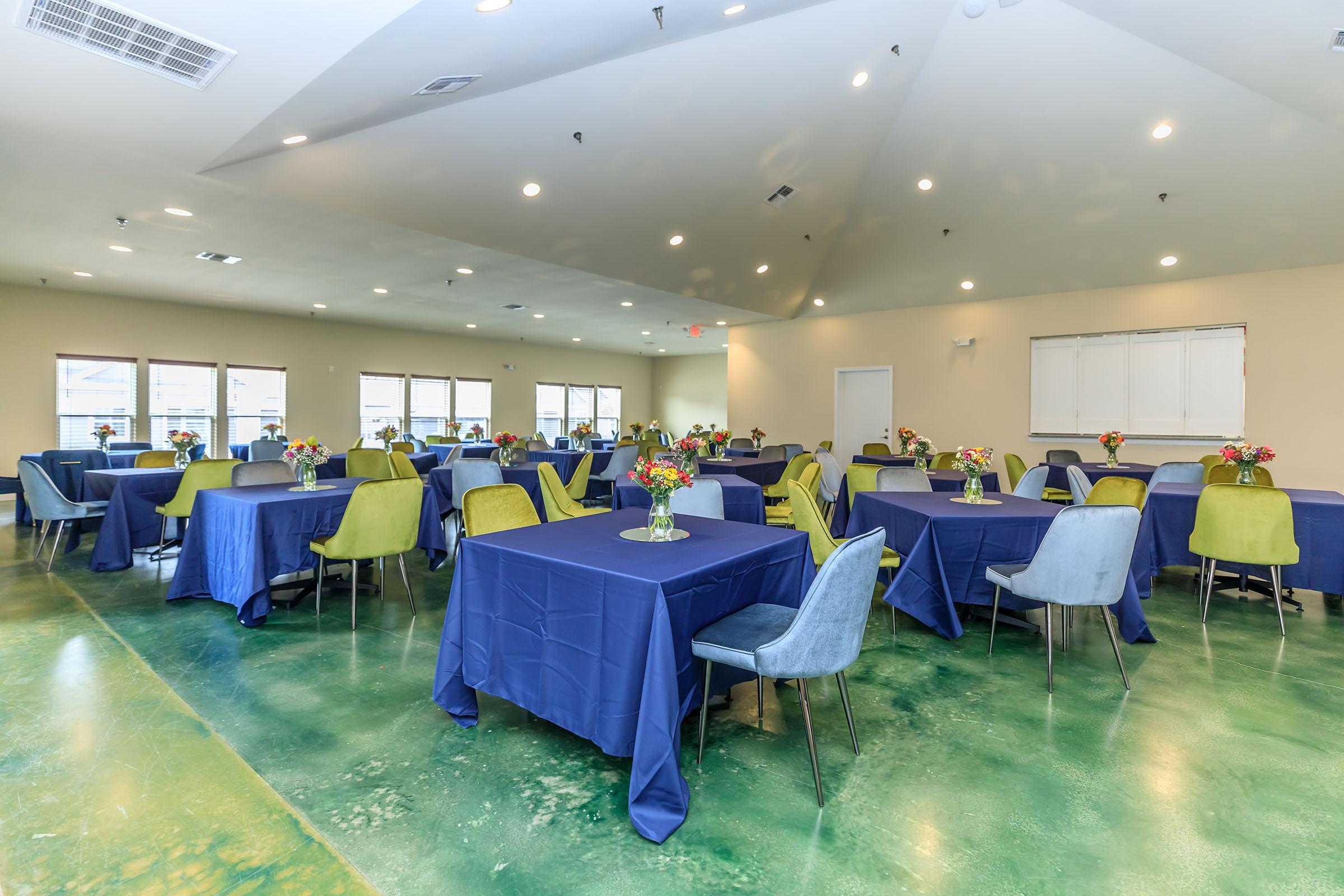 a room filled with furniture and a table