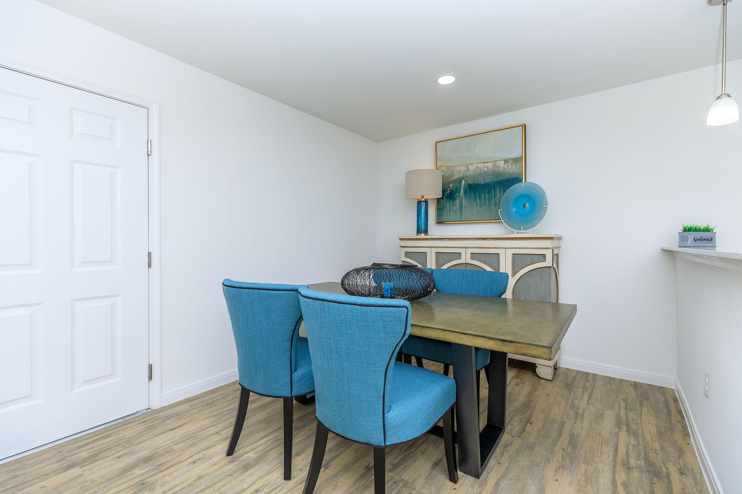 a blue chair in a room