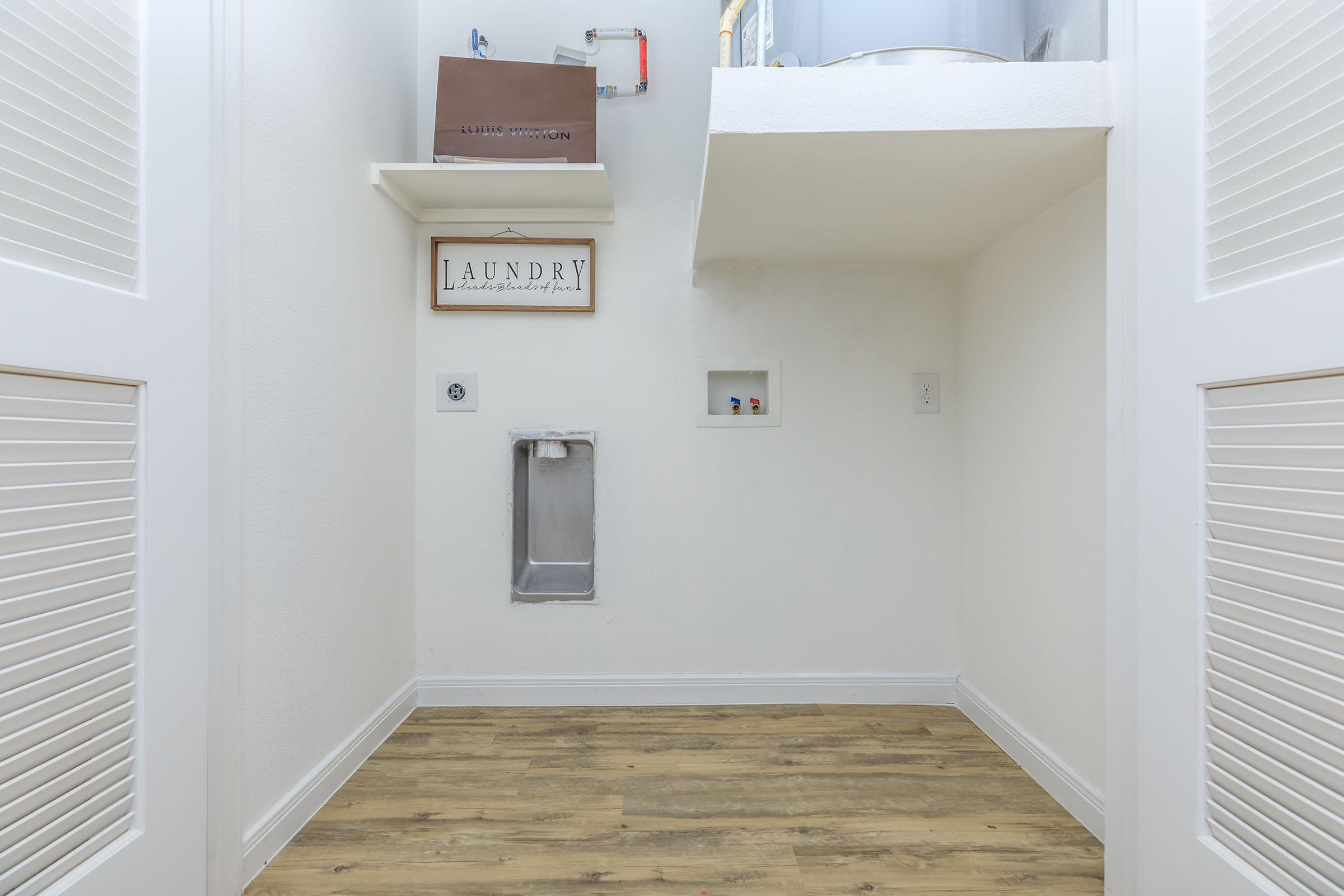 a room with a sink and a window