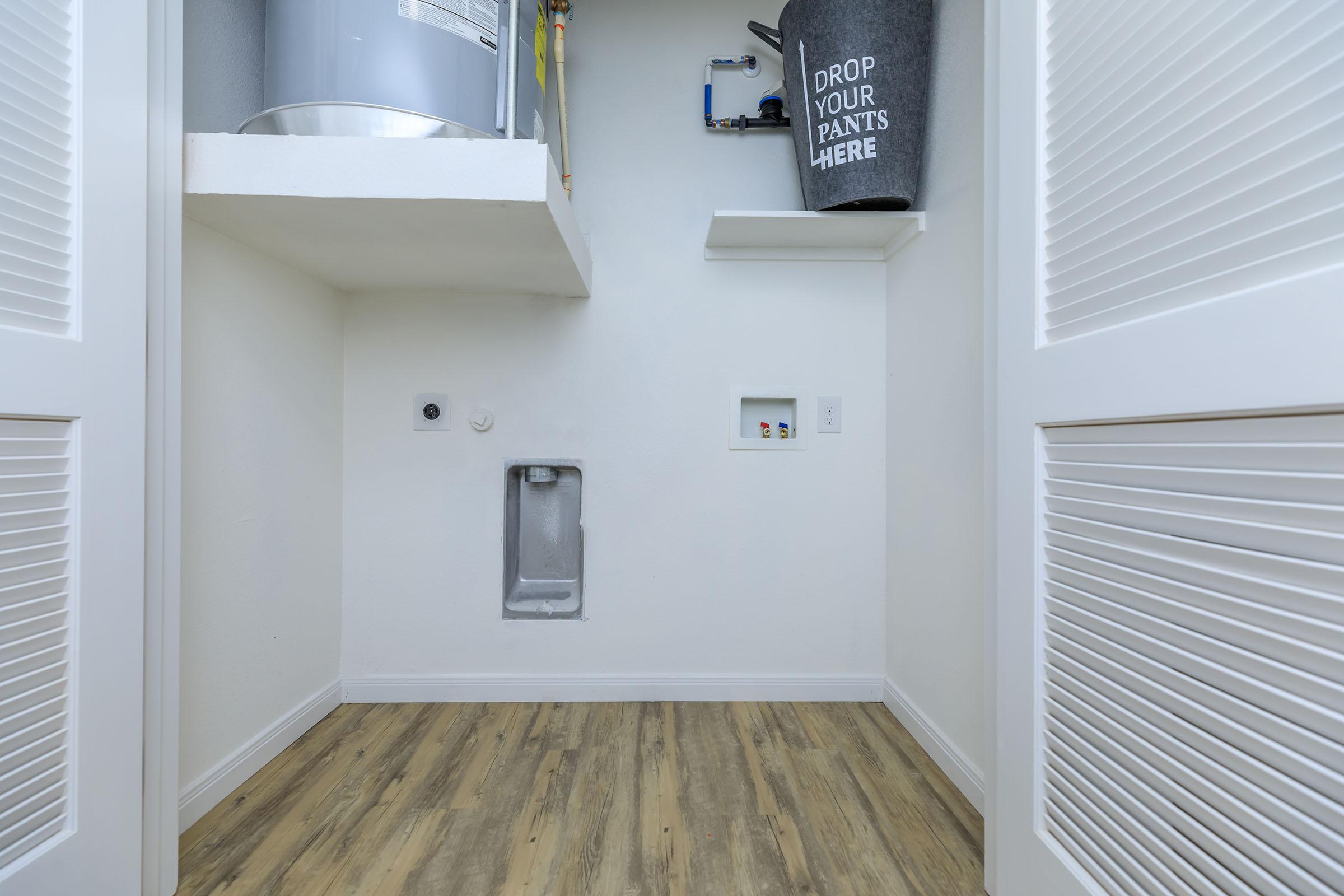 a room with a sink and a window