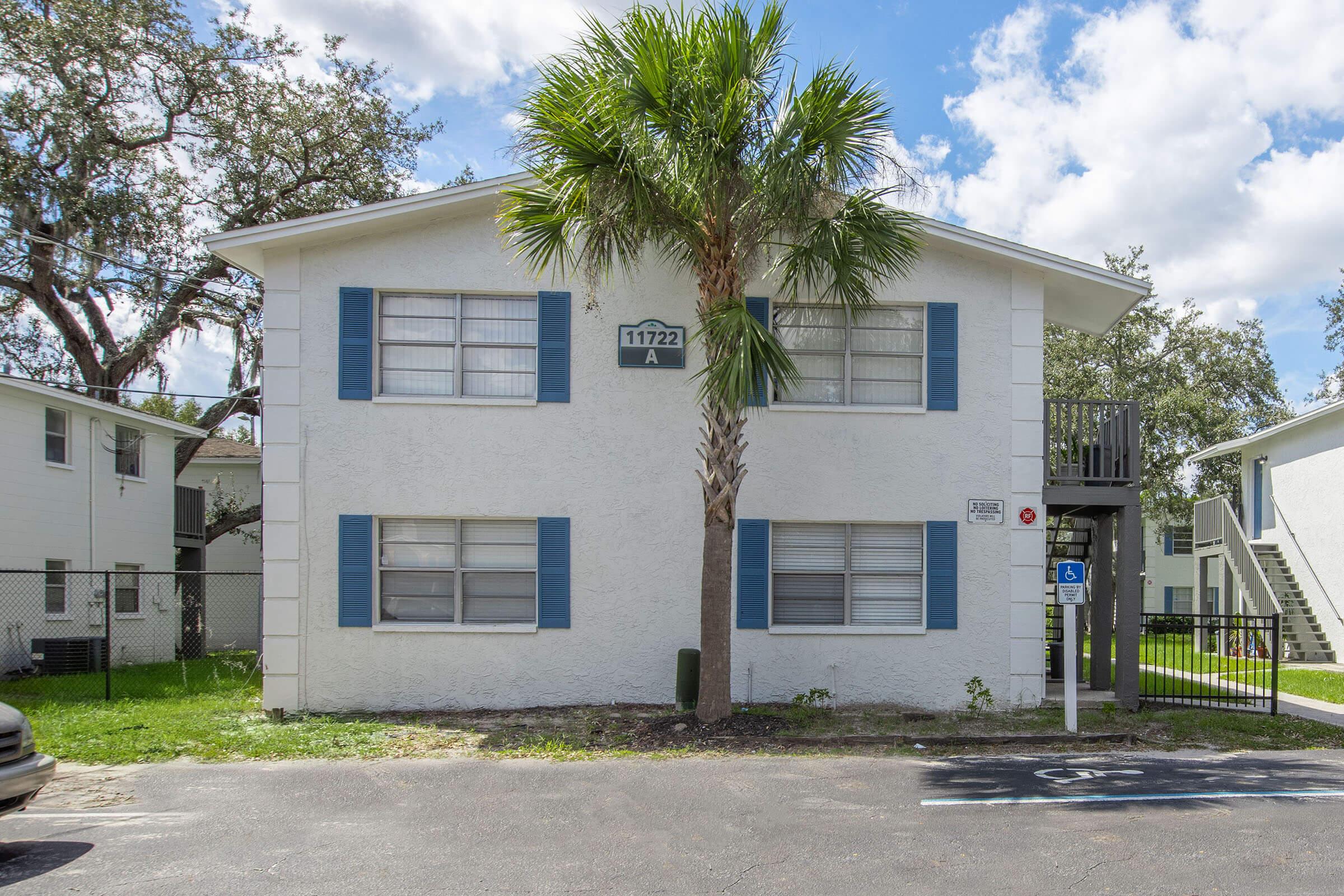 a house that is parked on the side of a building