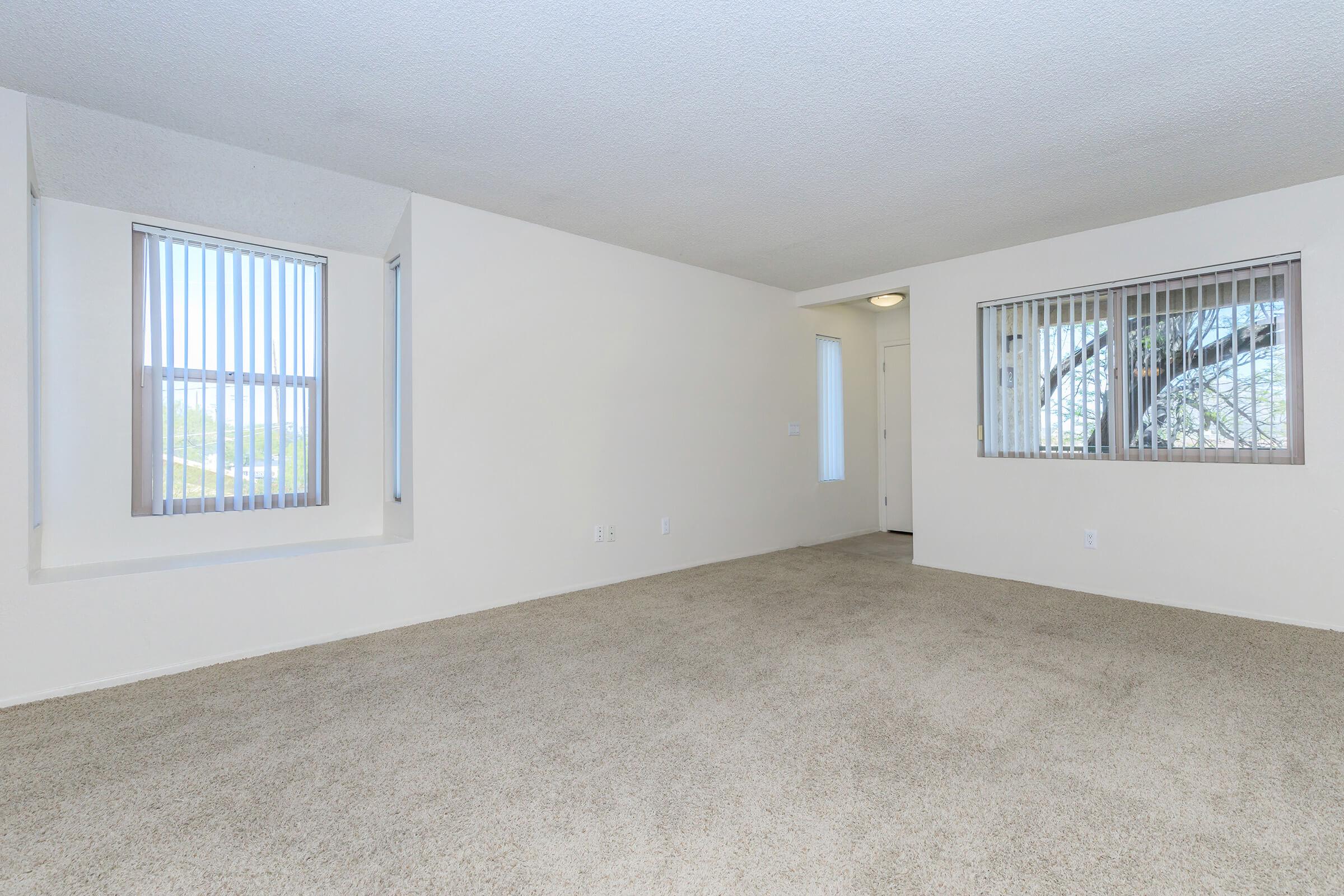 a living room next to a window