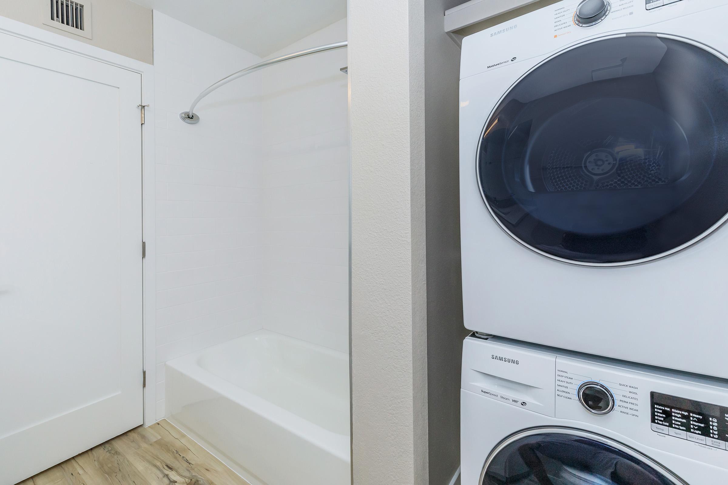 a microwave oven sitting on top of a stove