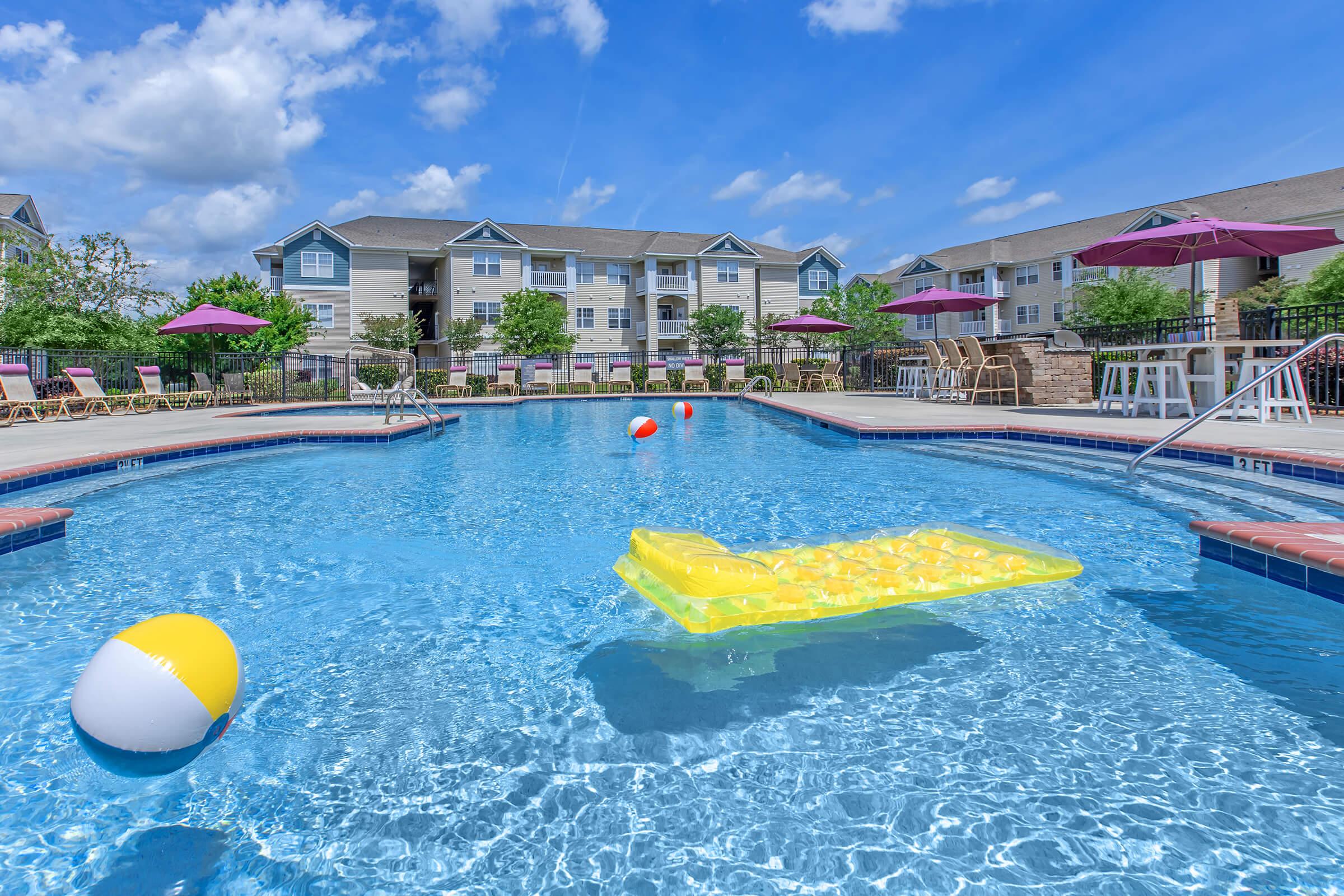 a pool next to a body of water