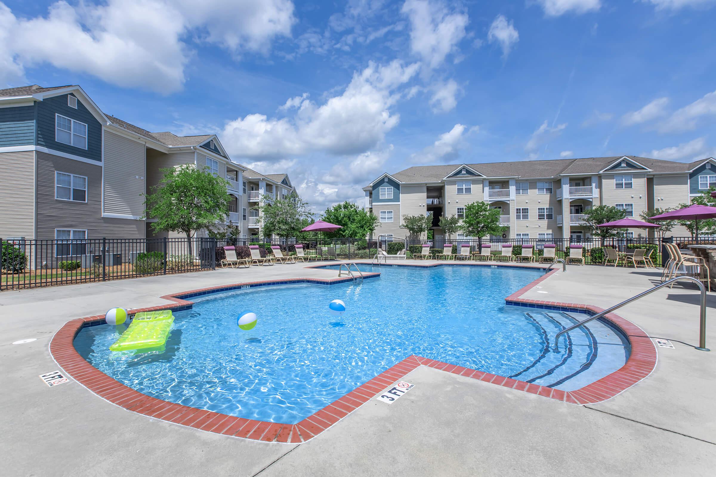 a pool next to a building