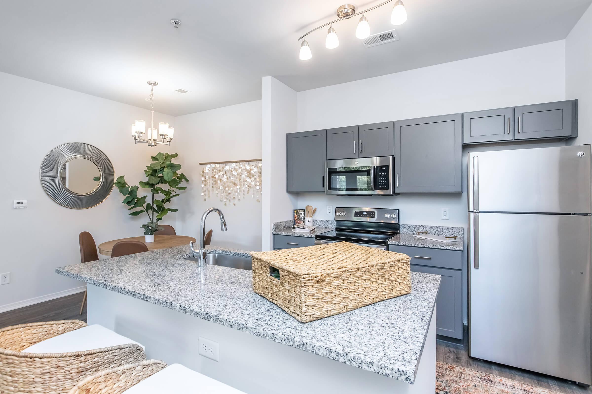 a kitchen with a table in a room