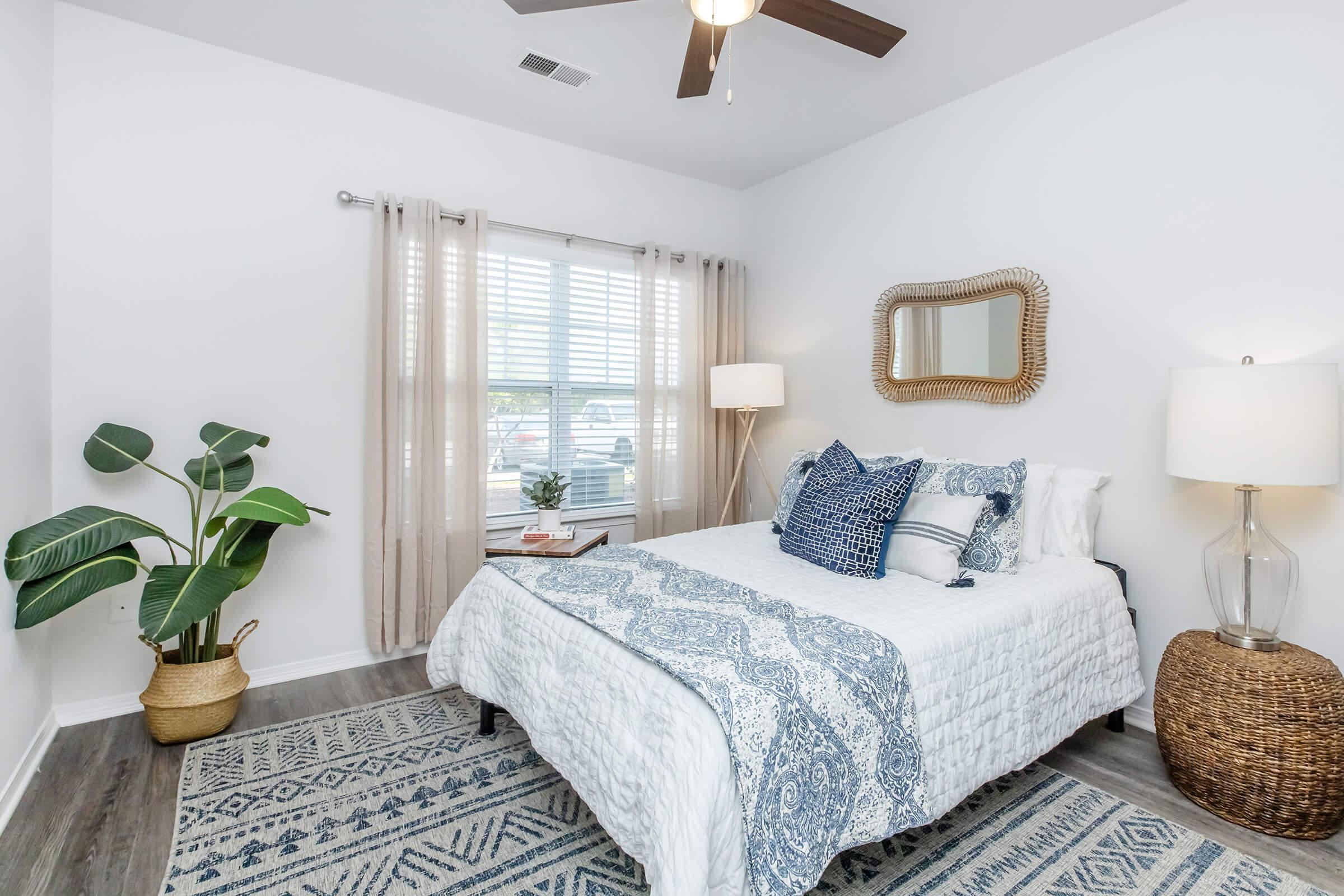 a bedroom with a bed in a hotel room