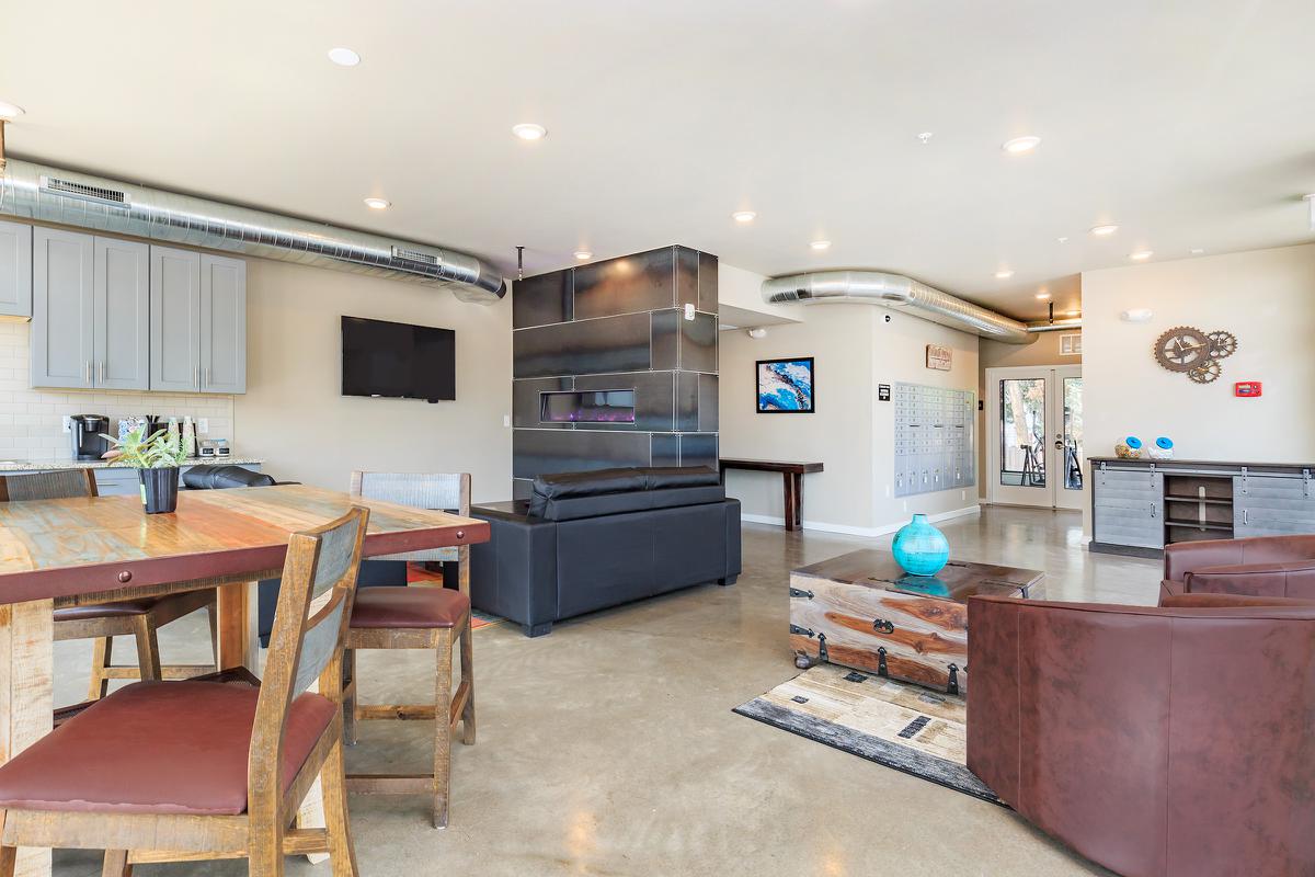 a room filled with furniture and a table