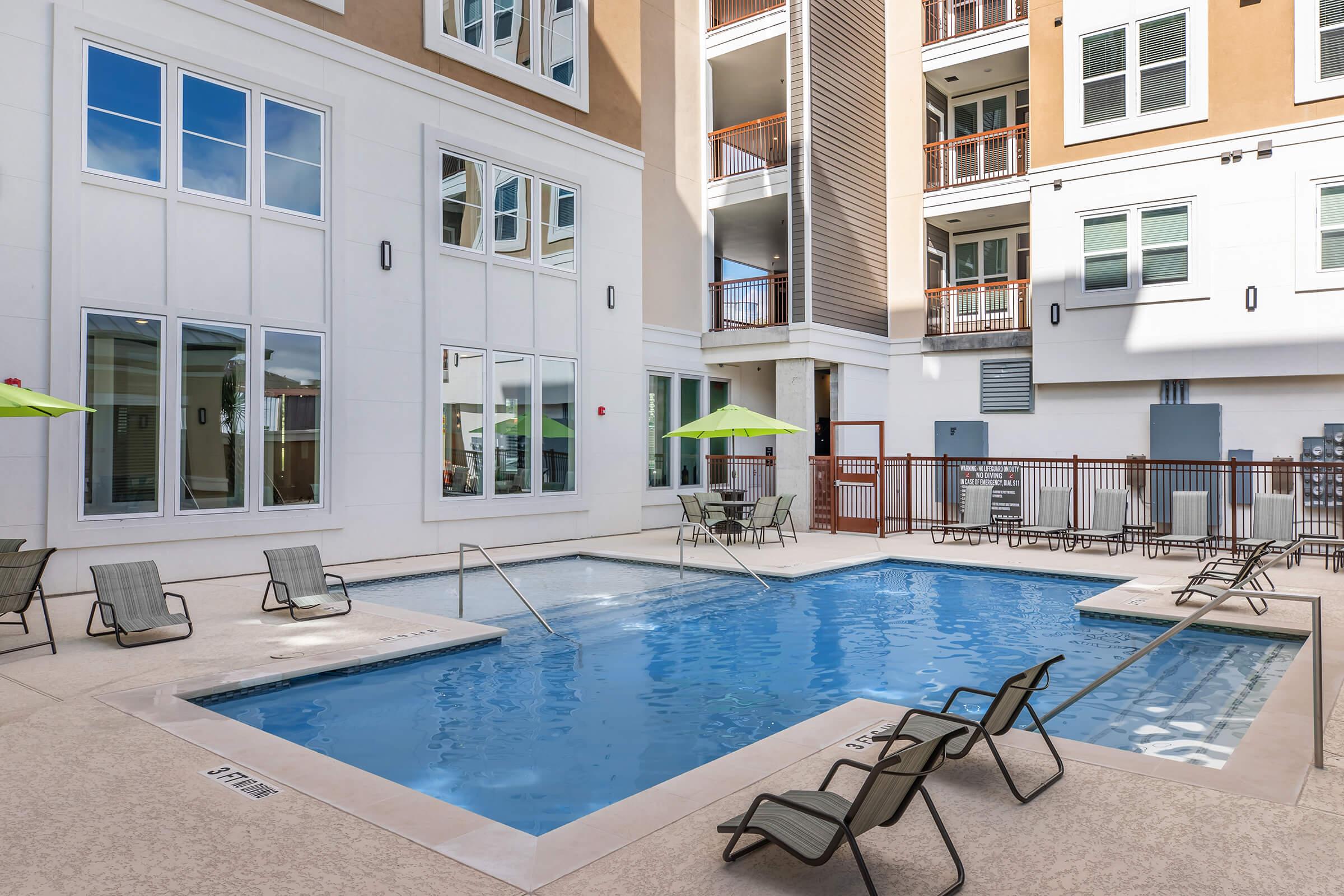 a pool of water in front of a building