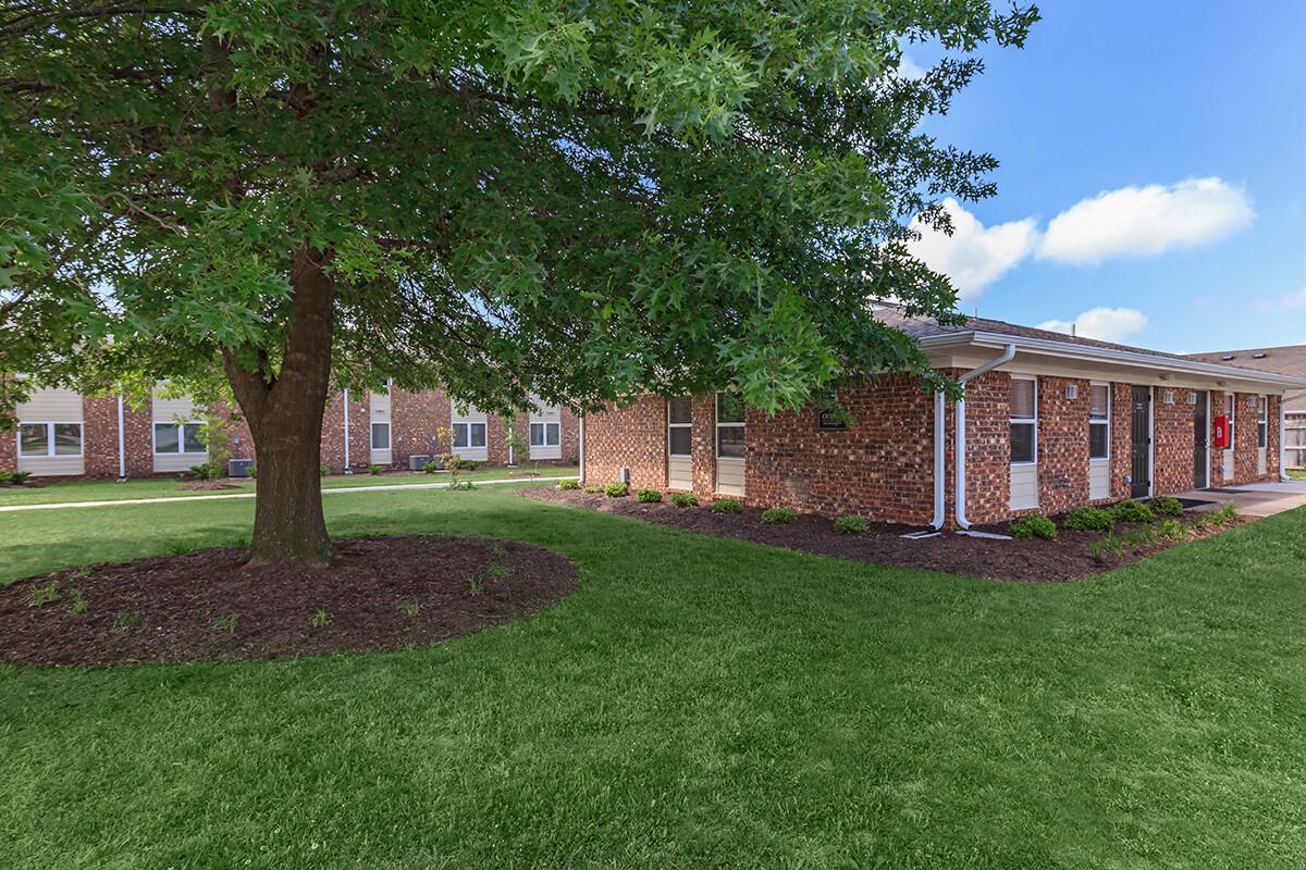 a large lawn in front of a house