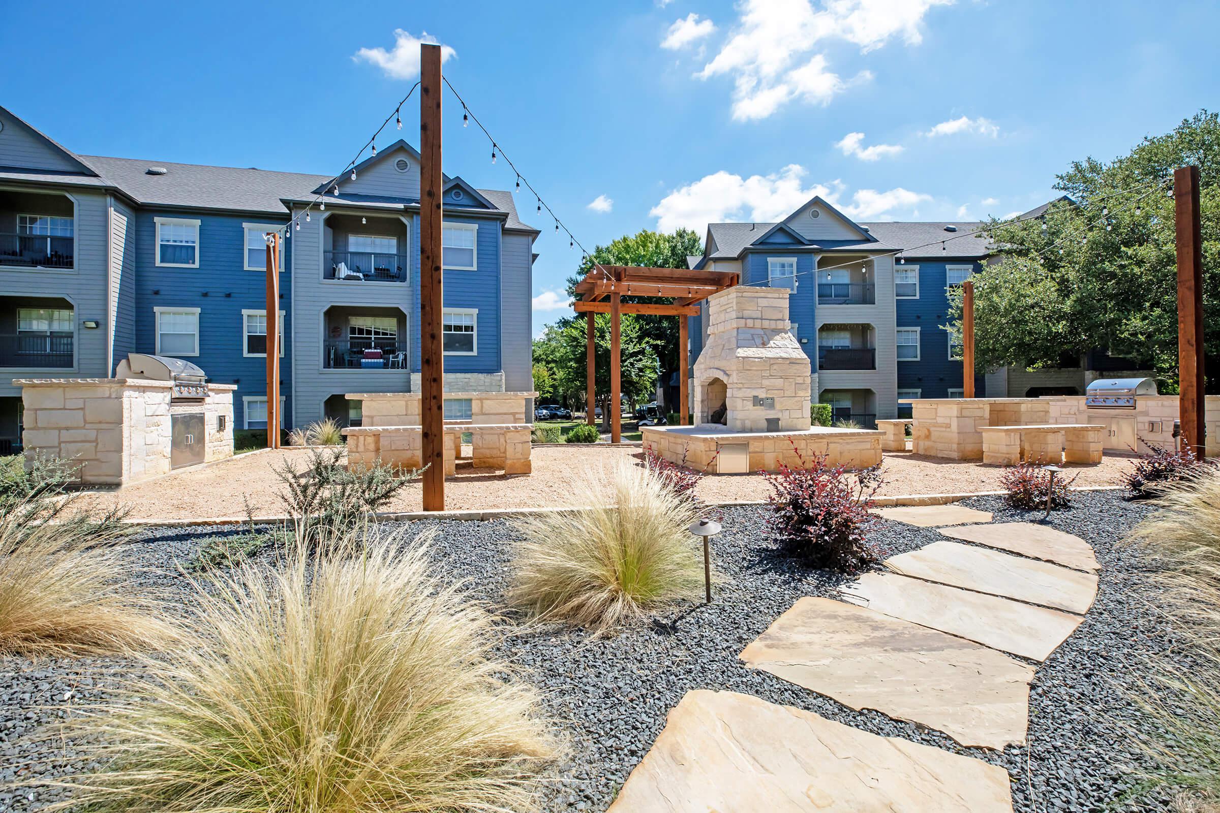 community courtyard with stainless steel barbecues