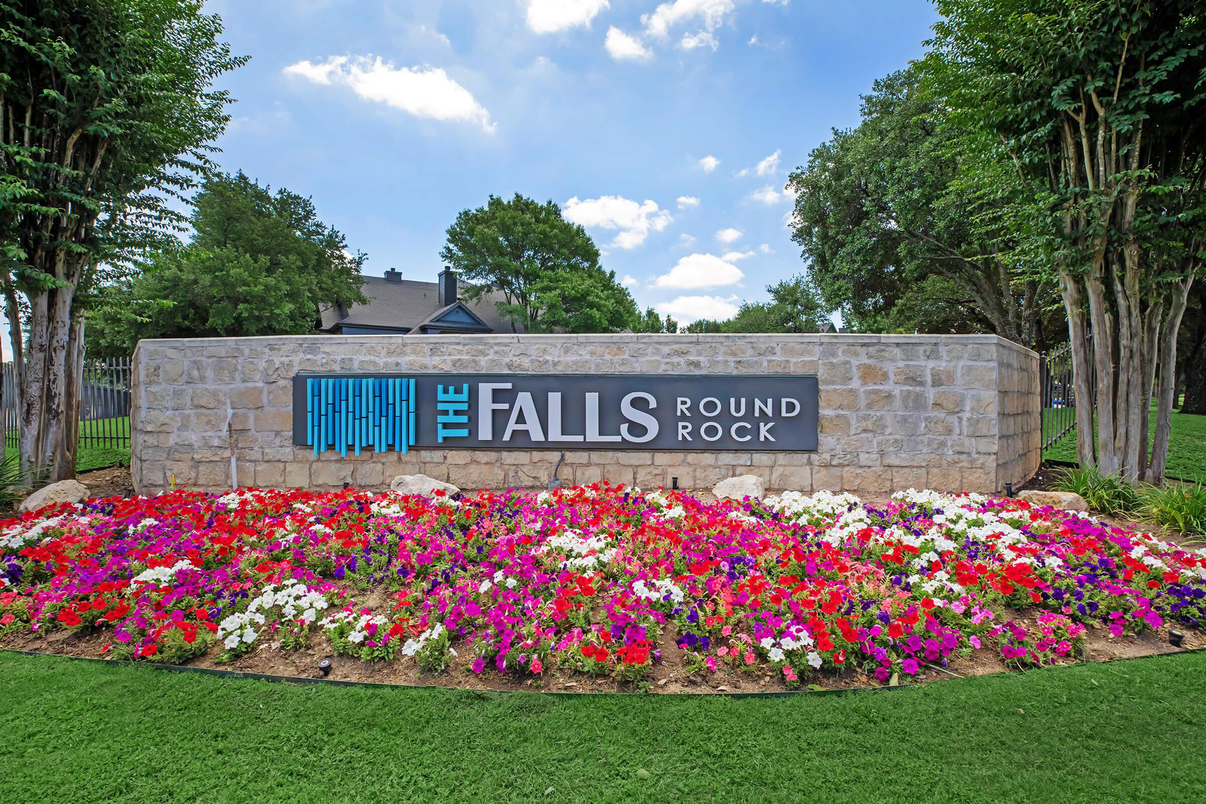 The Falls Round Rock Apartments monument sign