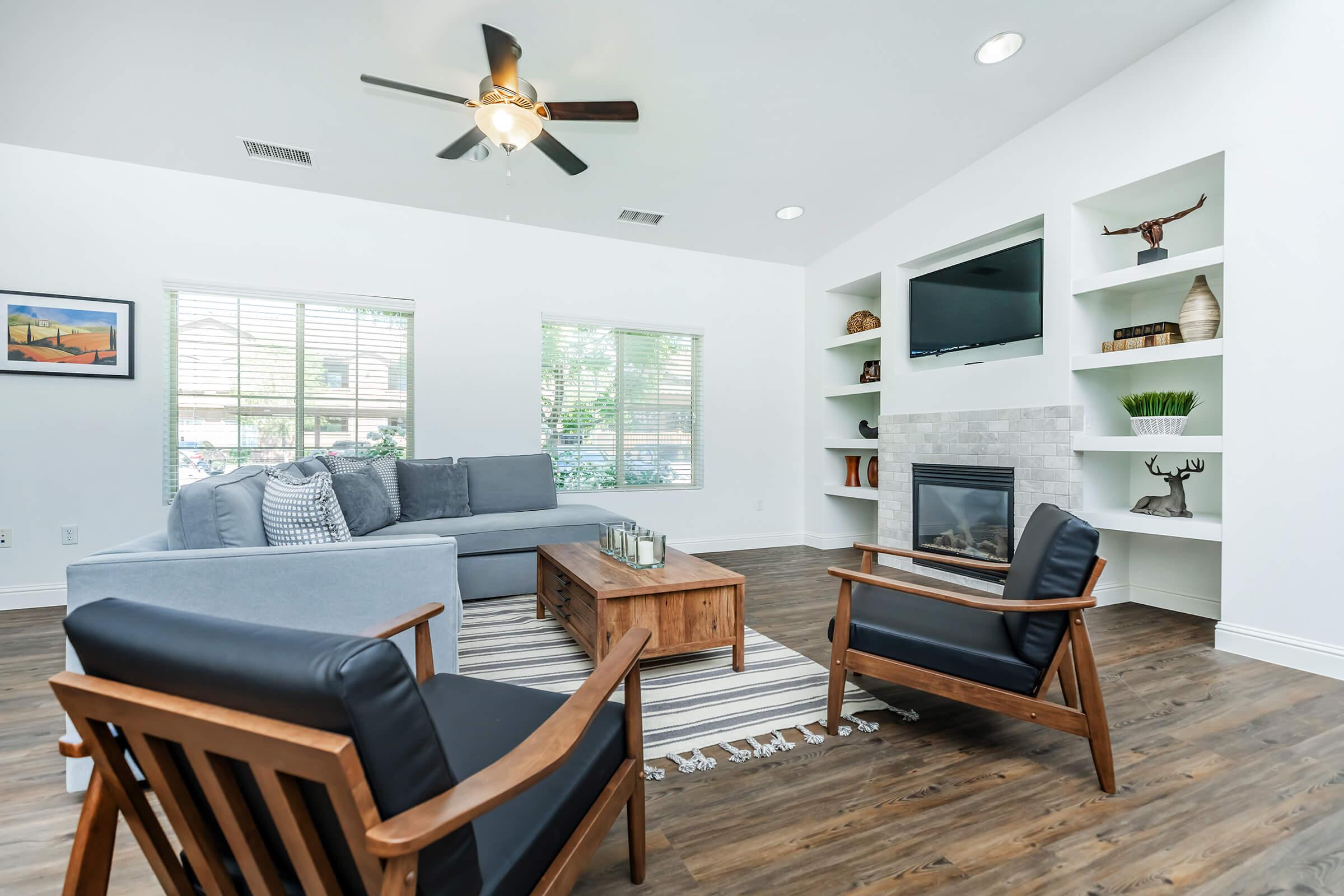 a living room with a couch and a chair