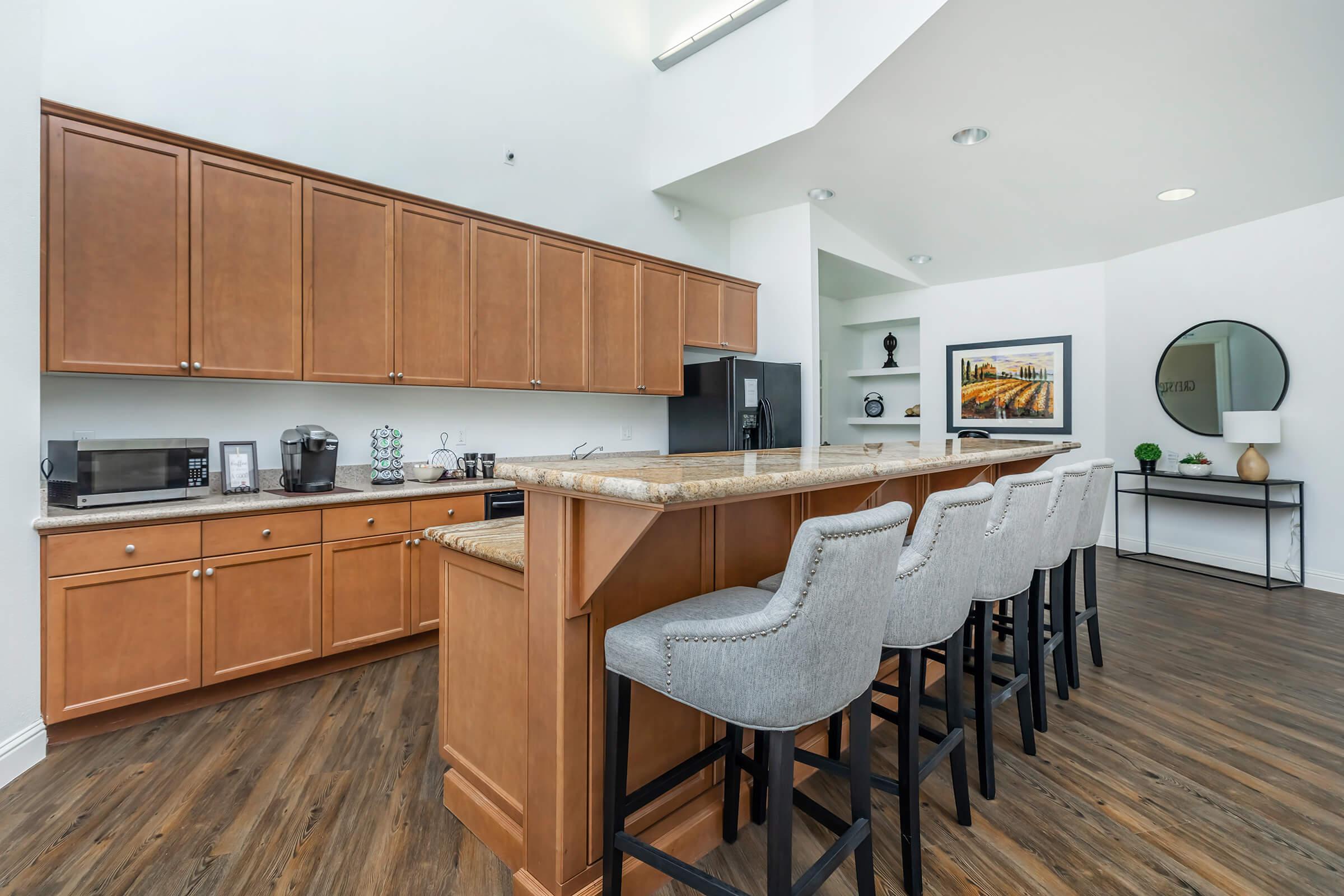 a kitchen with a wooden floor