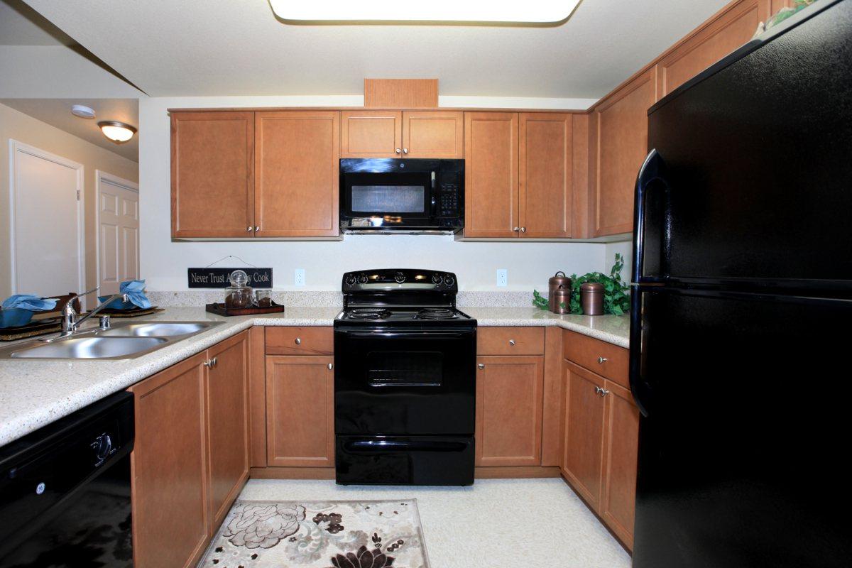 The kitchens at Greystone Apartments has lots of cabinet space