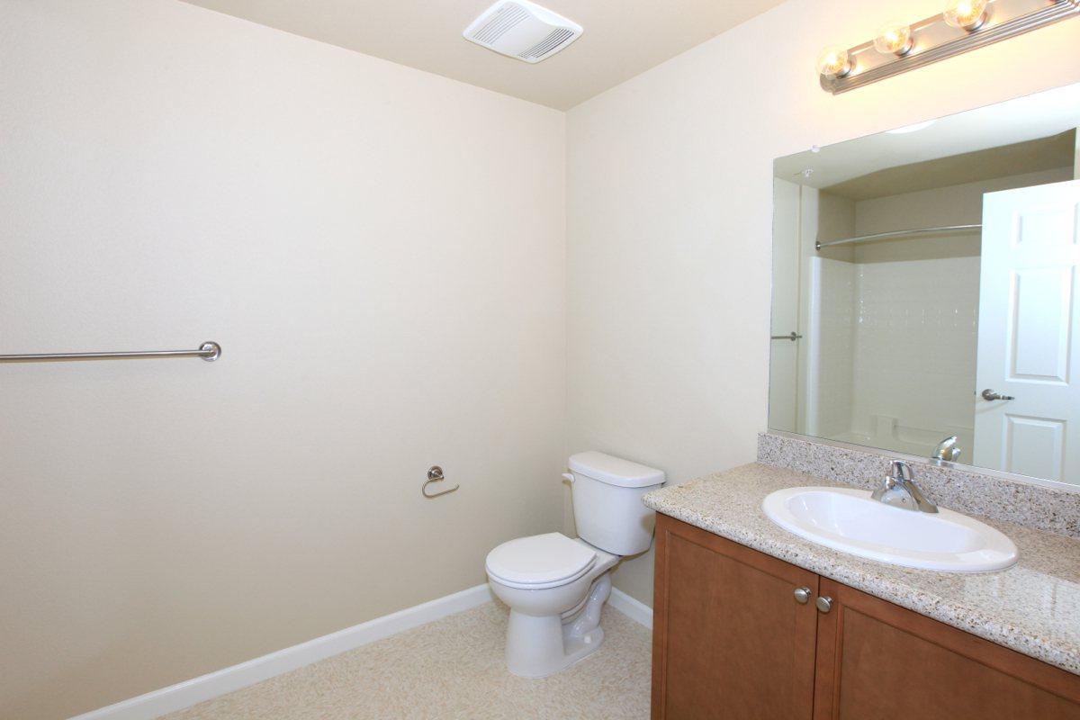 Contemporary bathrooms at Greystone Apartments