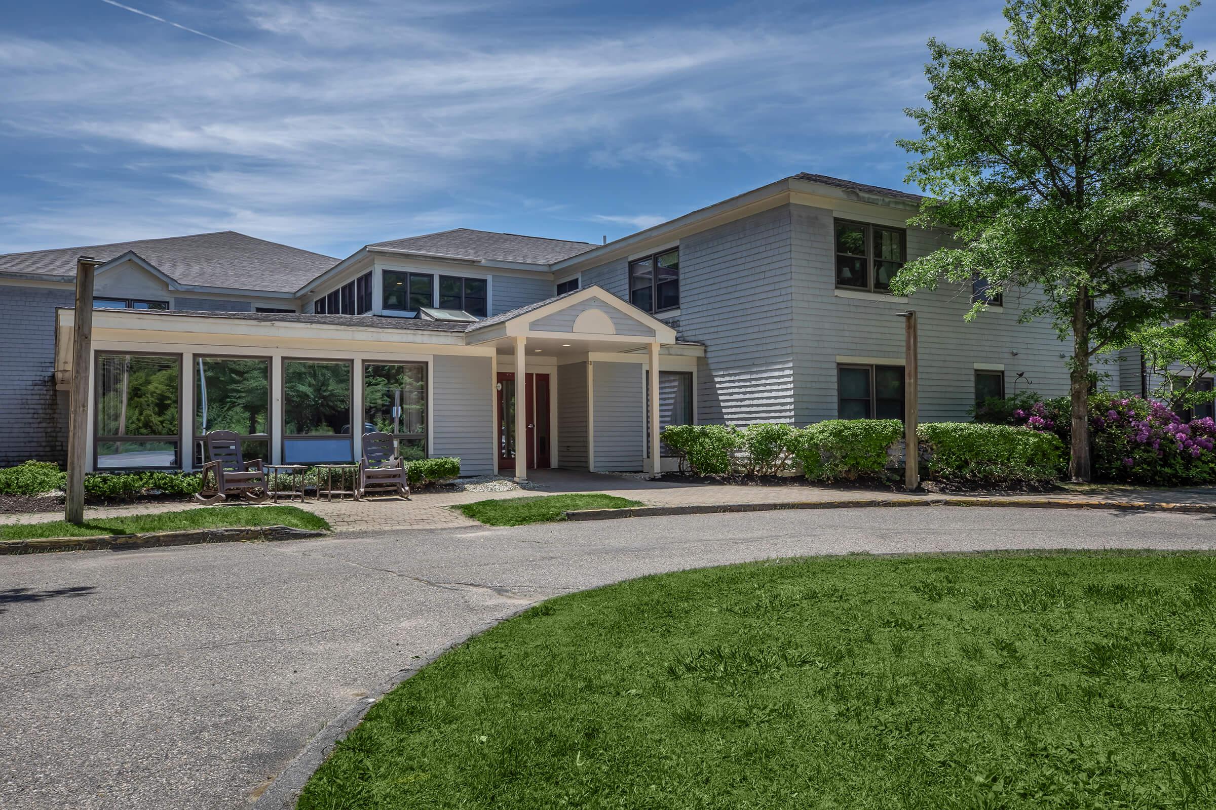 a large lawn in front of a house