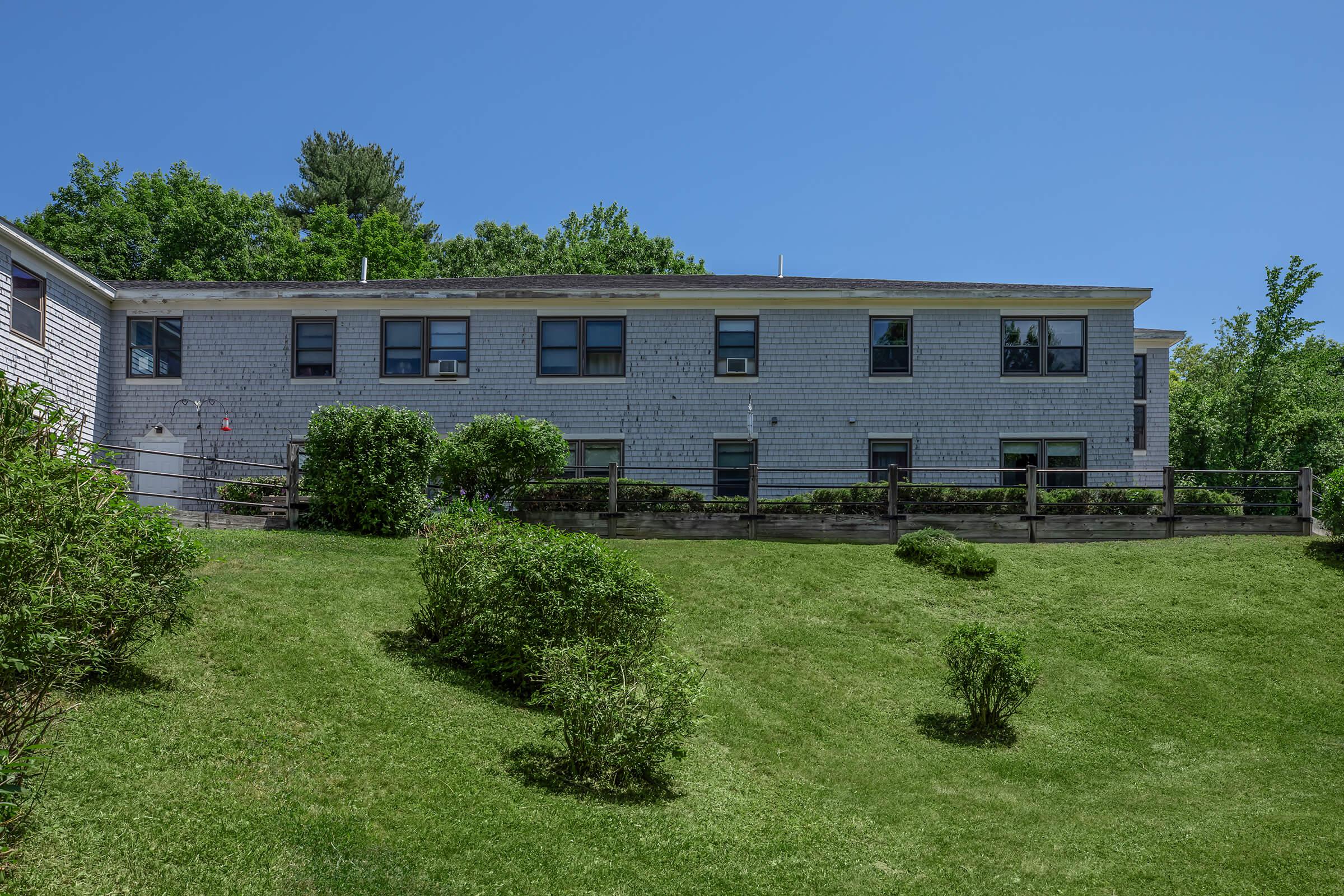 a large lawn in front of a house