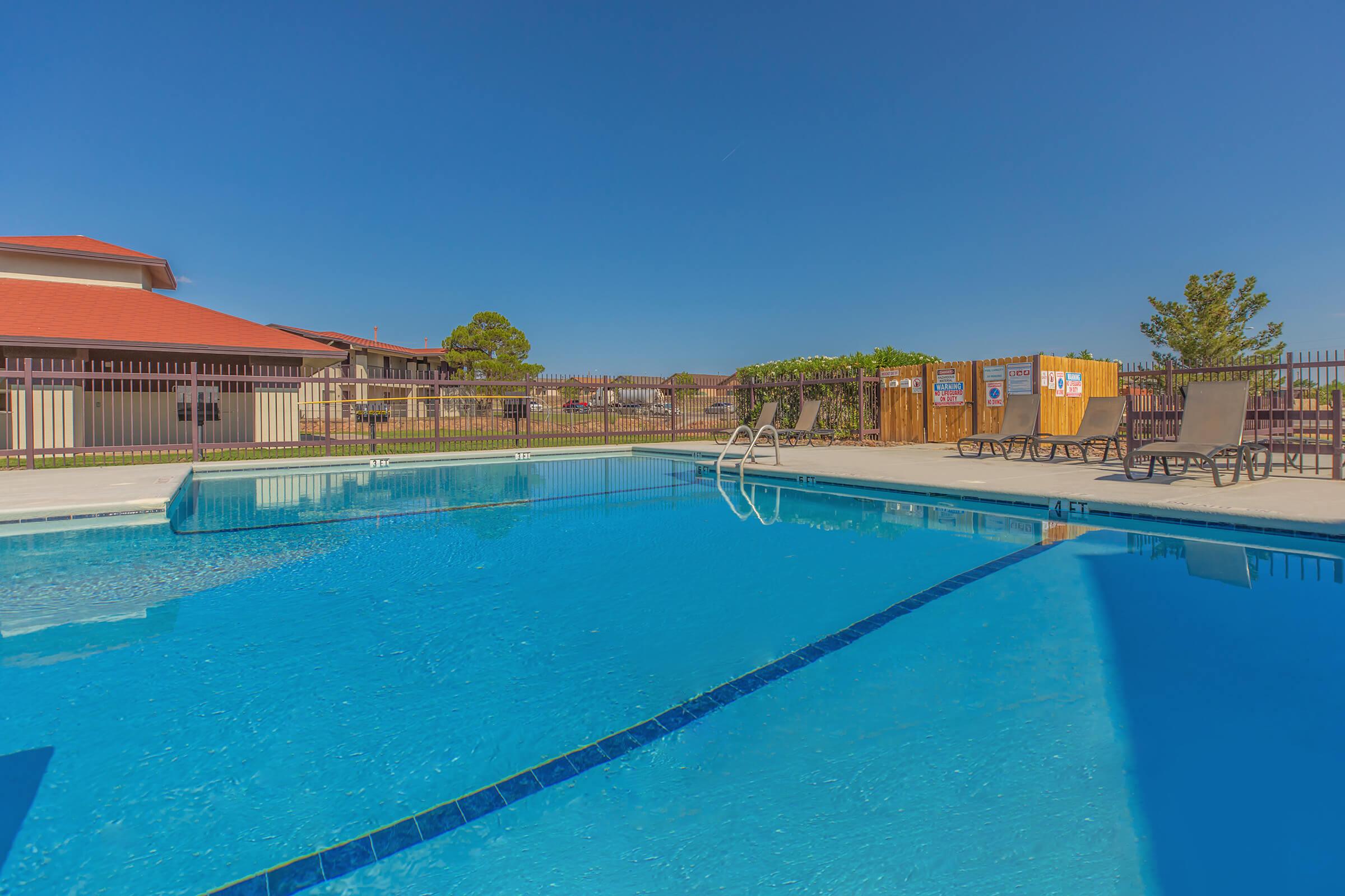a pool next to a body of water