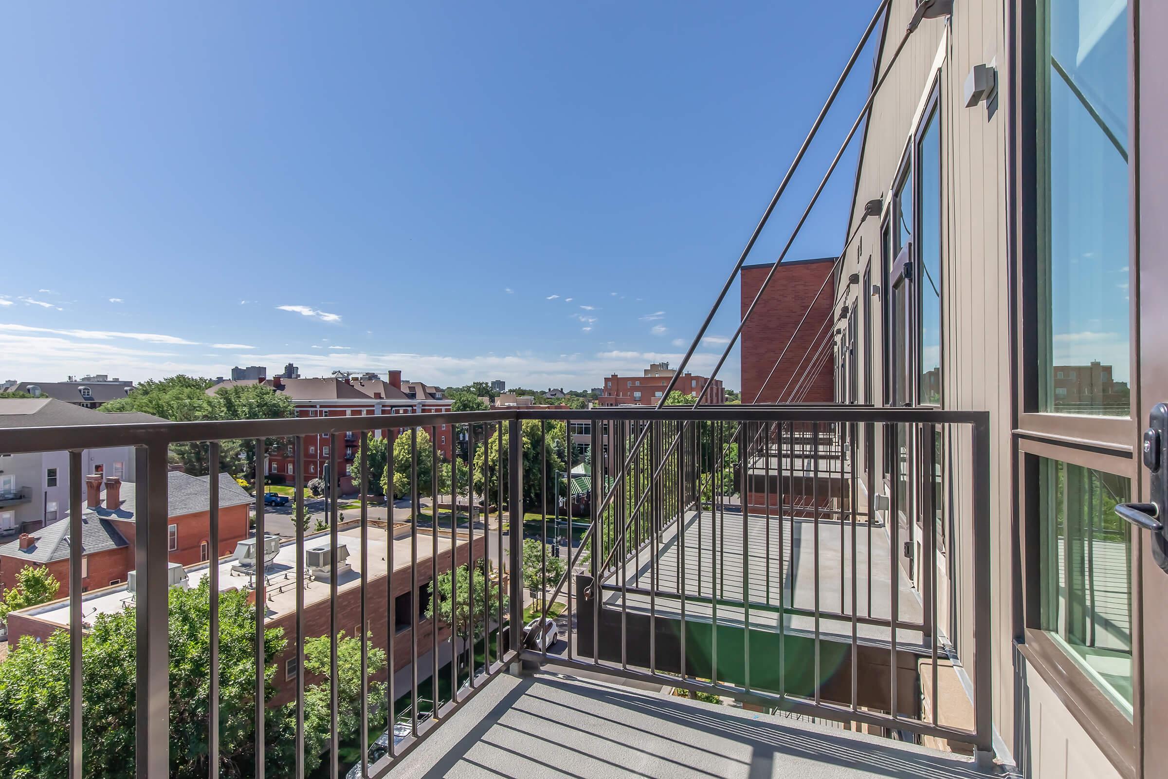 a building with a metal fence