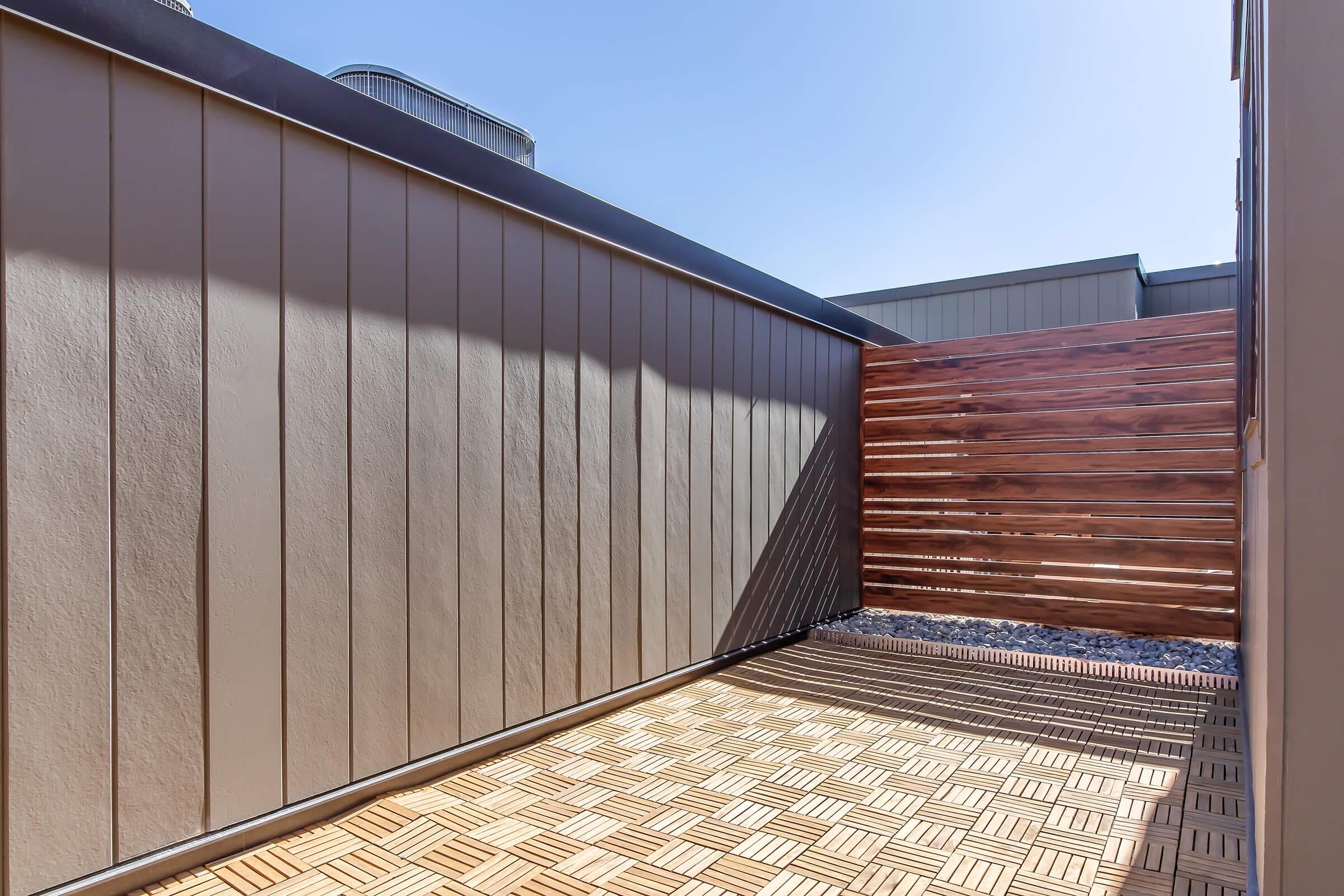 a building with a metal fence