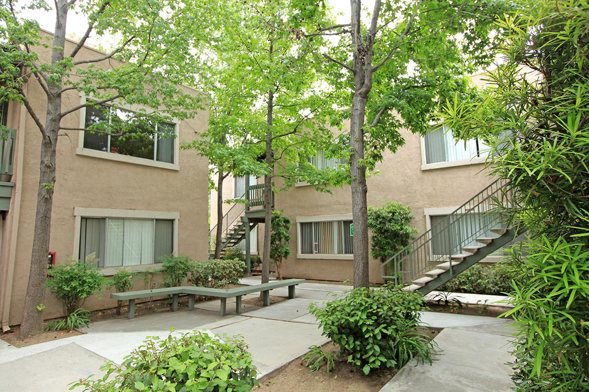 a garden in front of a building