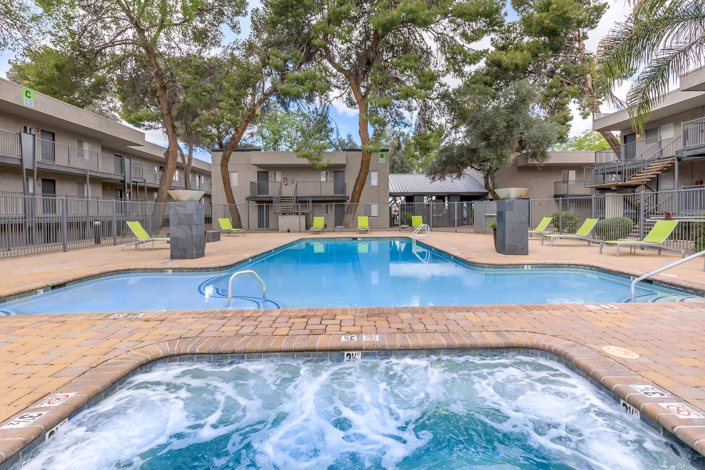 RELAX IN THE SOOTHING SPA AND SHIMMERING SWIMMING POOL