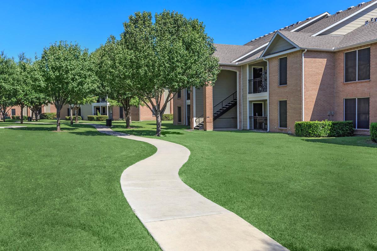 a large lawn in front of a house