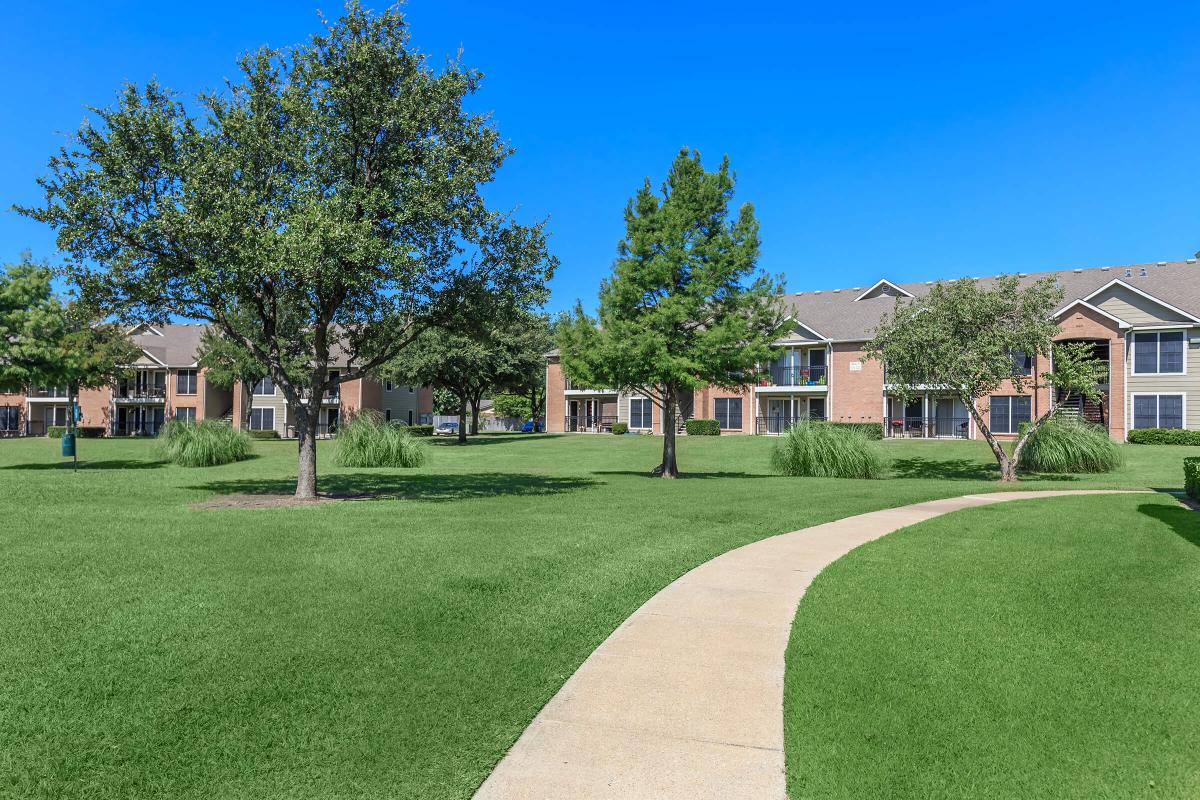 a large lawn in front of a house