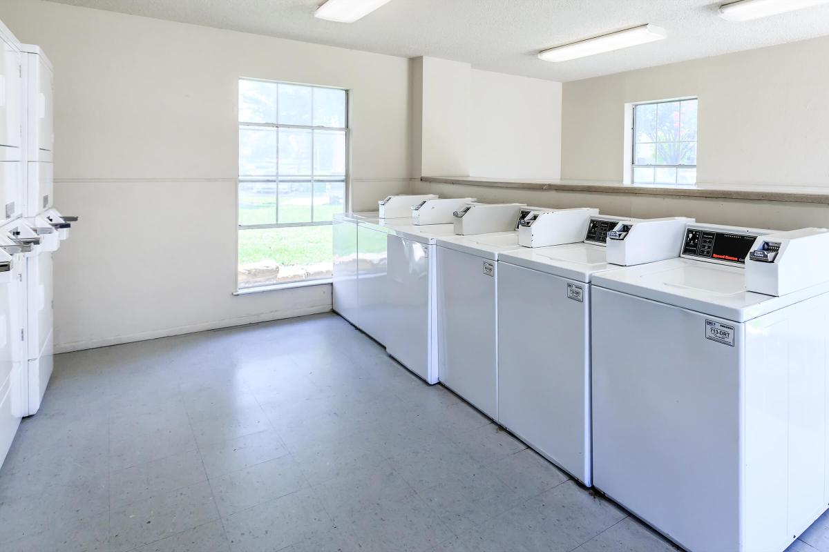 a large white refrigerator in a kitchen