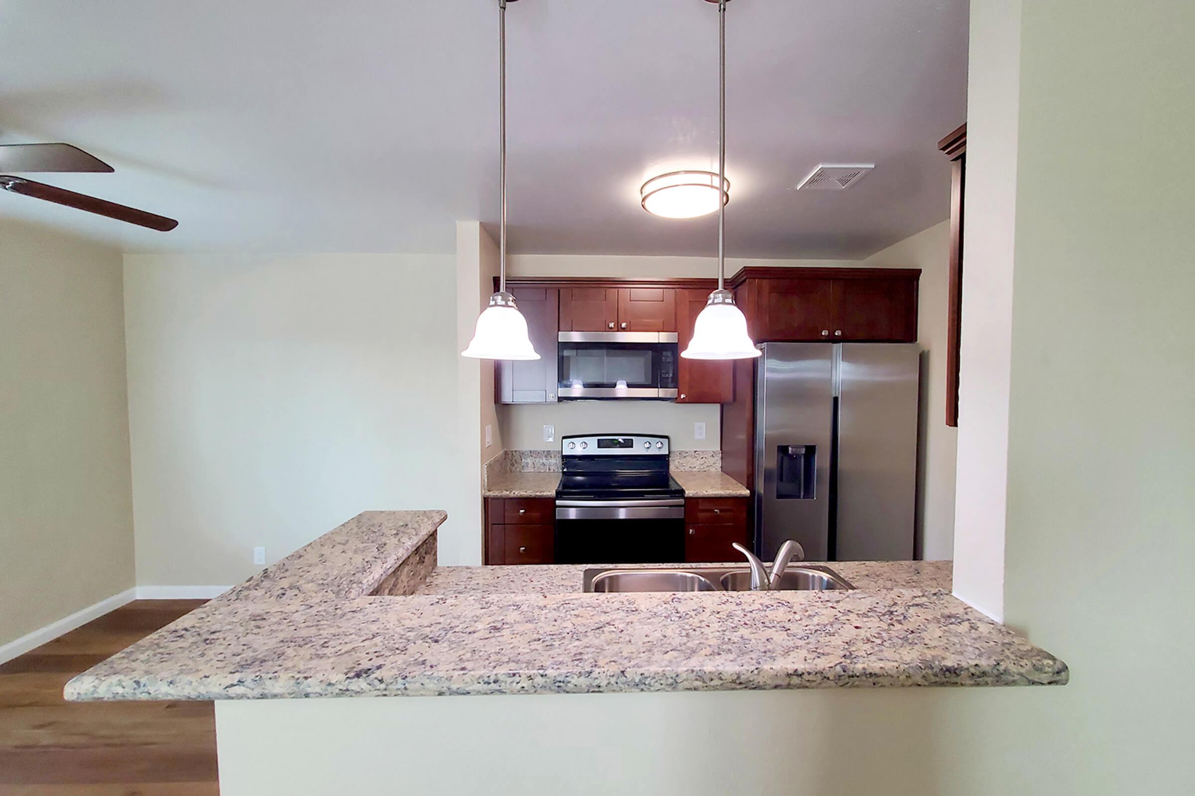 a stove top oven sitting inside of a room