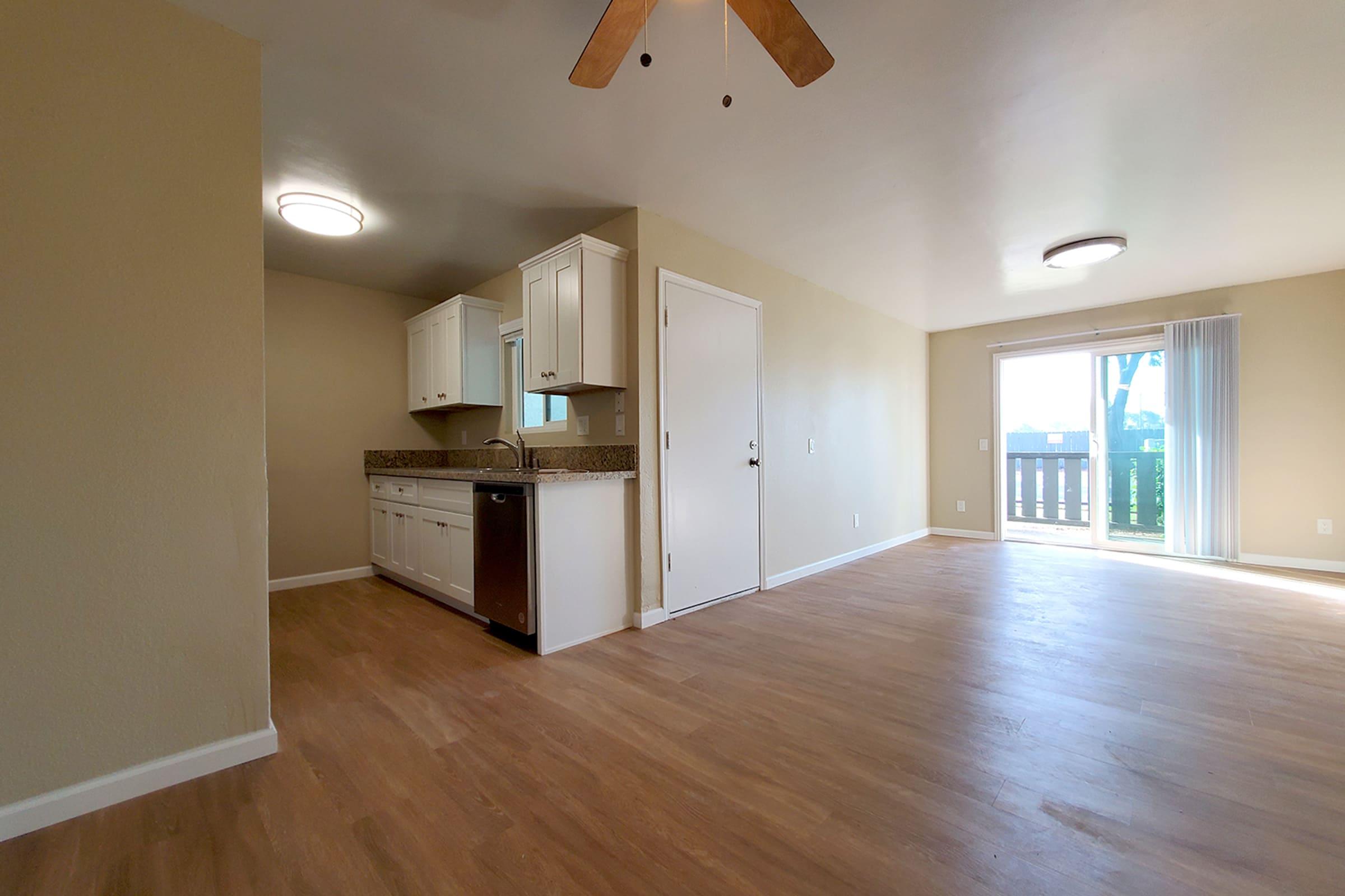 a kitchen with a wood floor