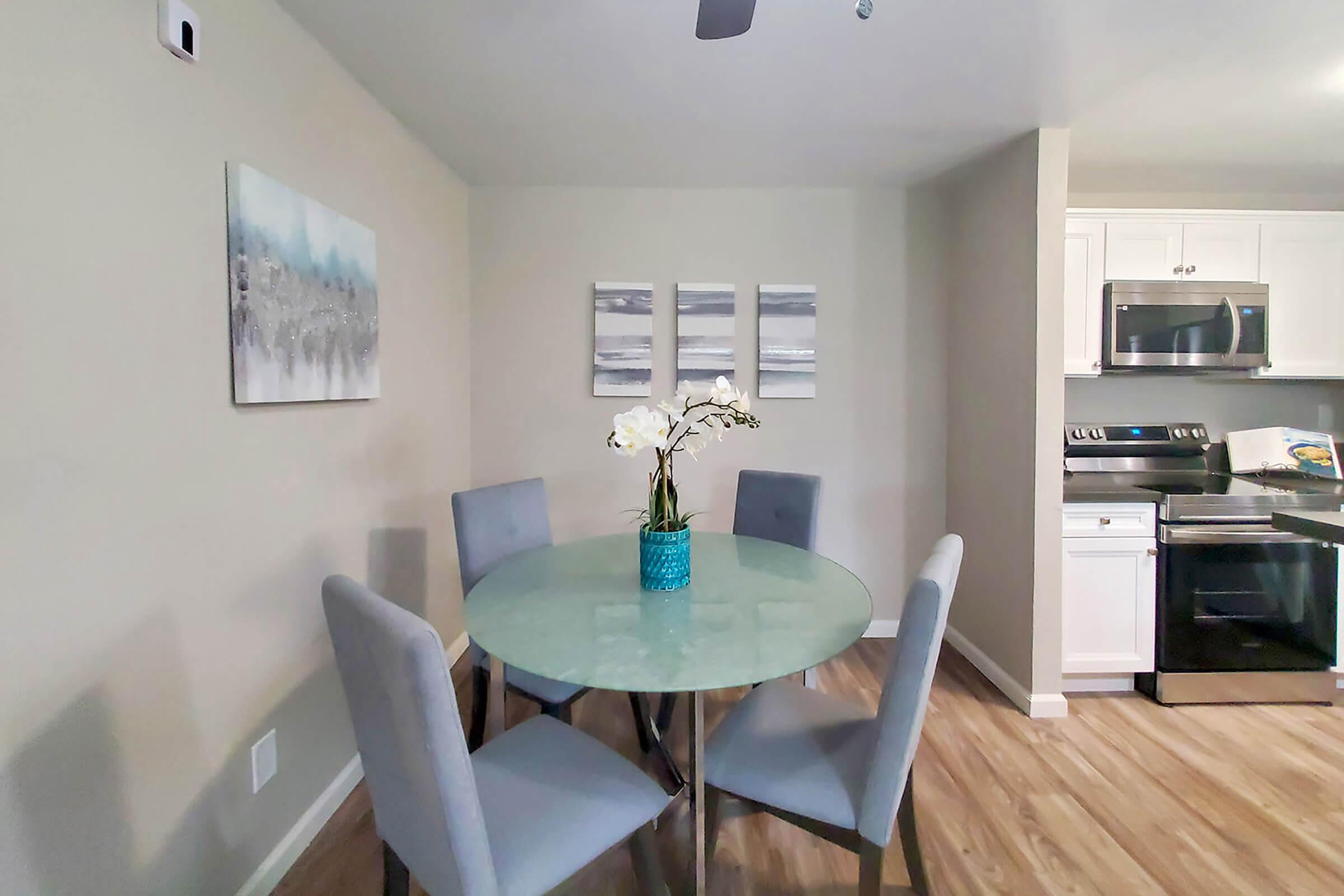 a living room filled with furniture and a table