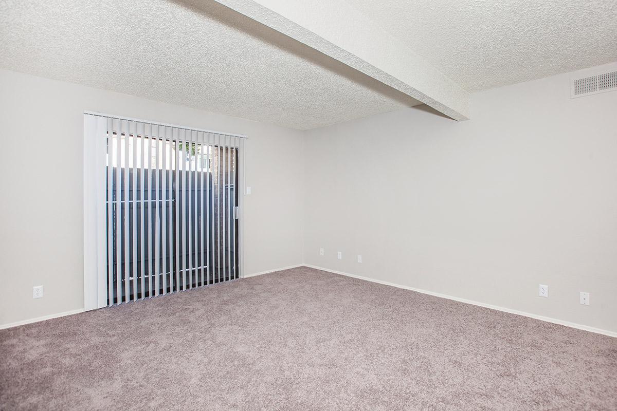 a bedroom with a bed in a room