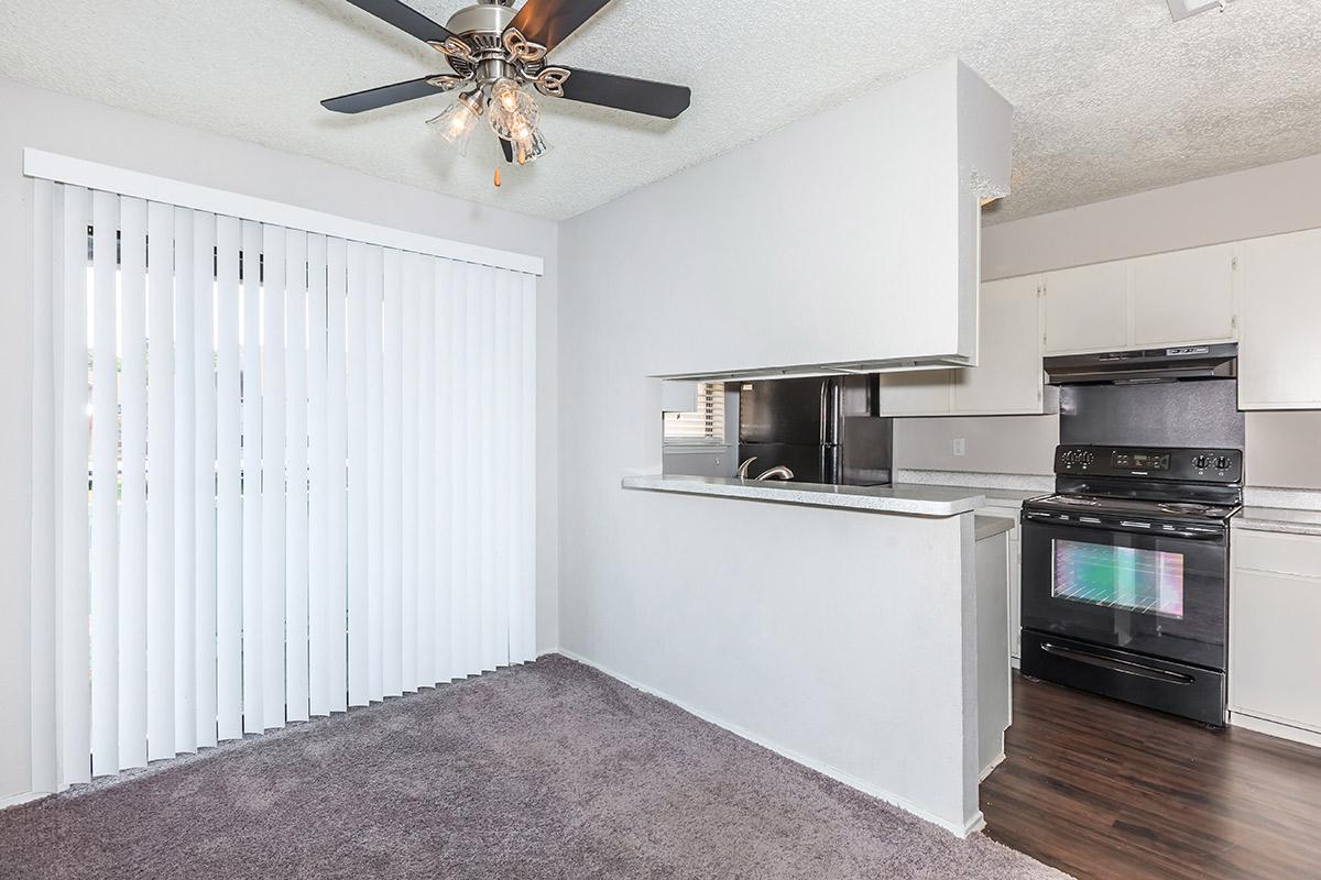 a room filled with furniture and a stove