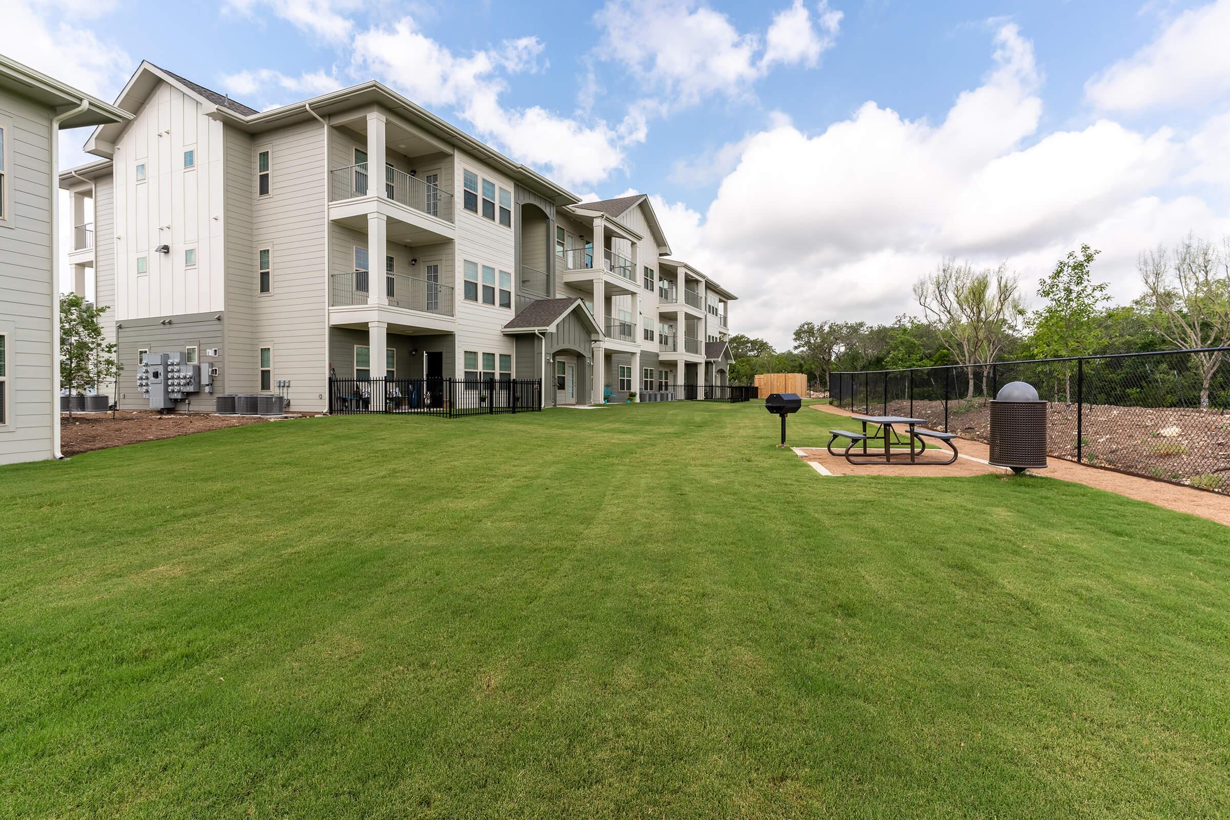 a large lawn in front of a house