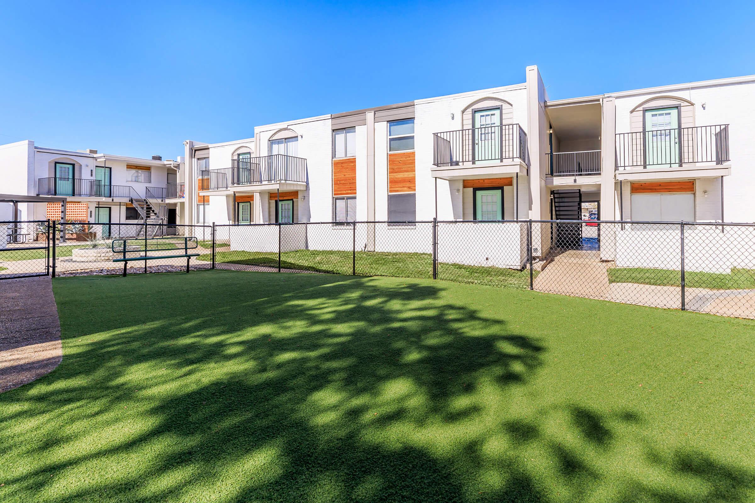 a large lawn in front of a house